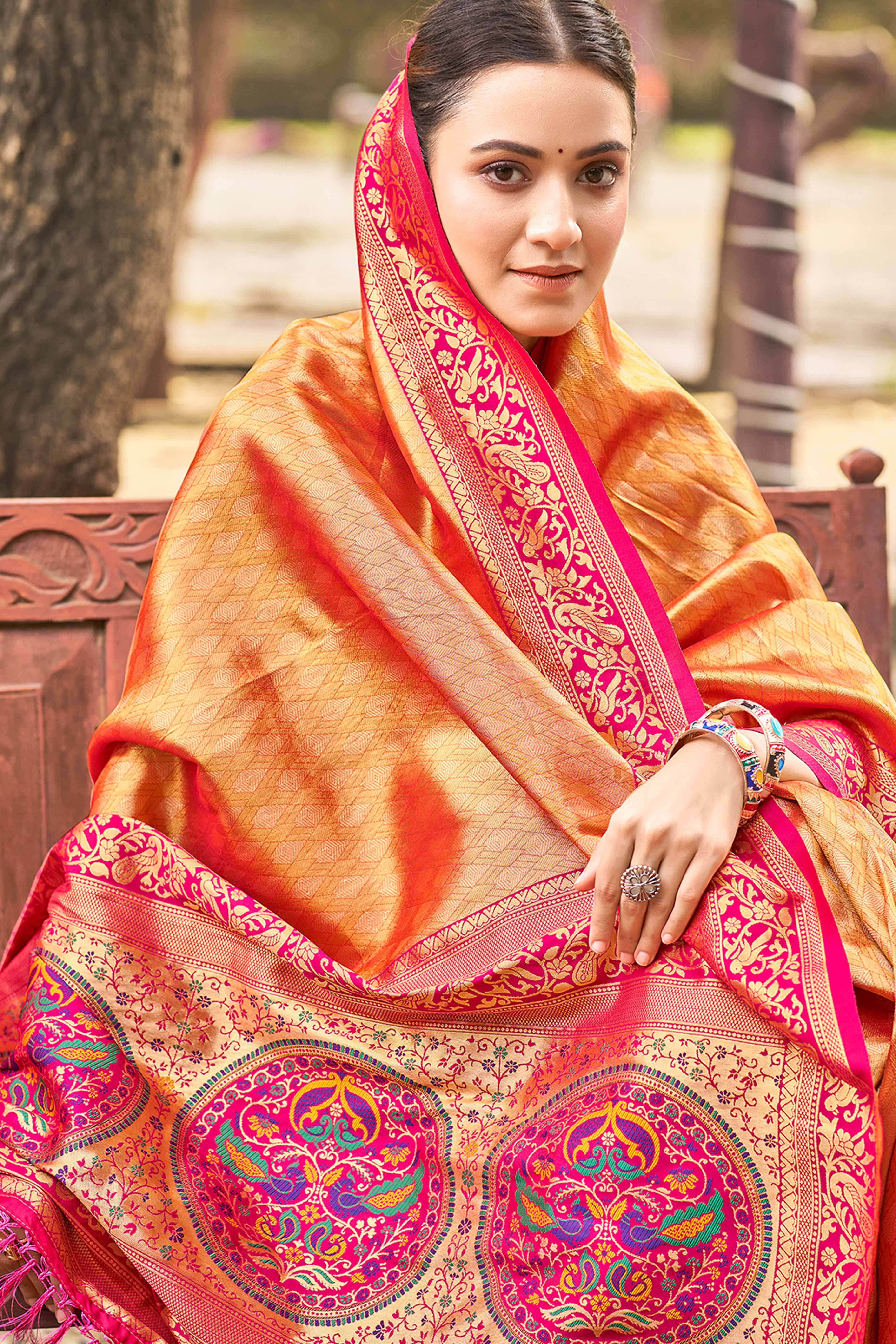 Orange Floral Woven Paithani Saree In Kanjivaram Silk With Graceful Tassel Pallu