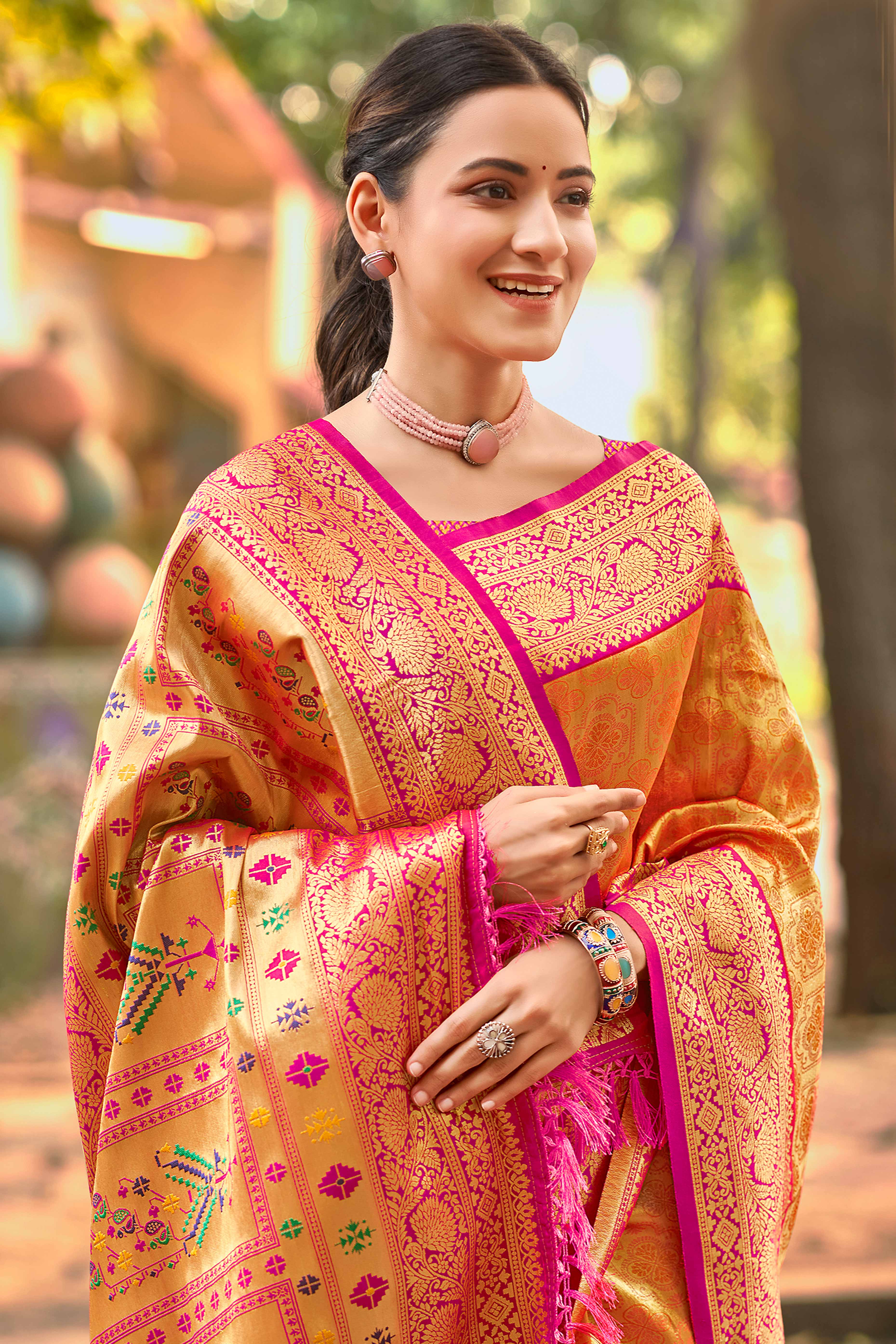 Orange Paithani Saree In Kanjivaram Silk Featuring Floral Woven Motifs & Tassel Pallu