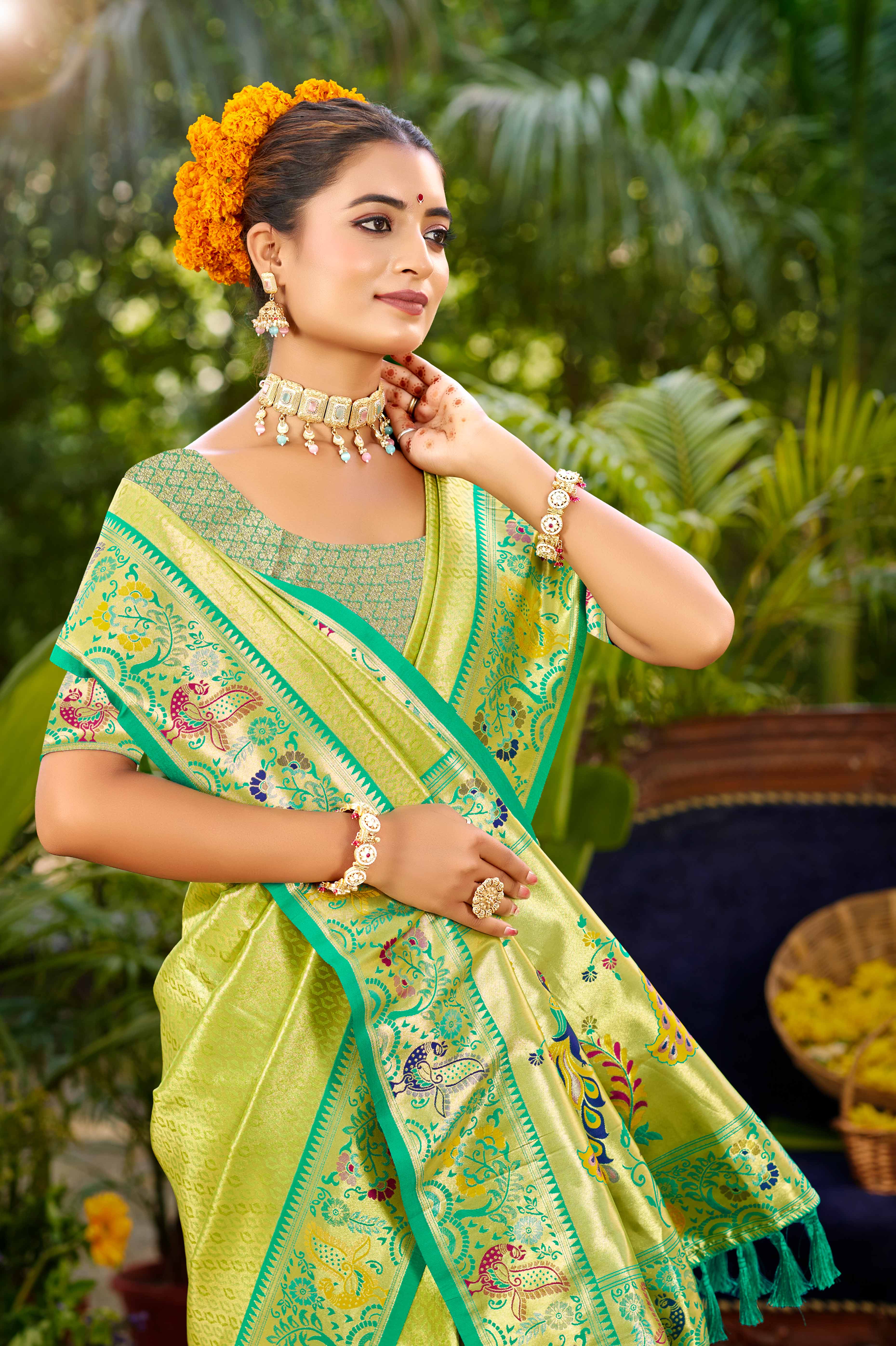 Graceful Green Silk Blend Saree Adorned With Intricate Zari Weave & Peacock Motif Pallu