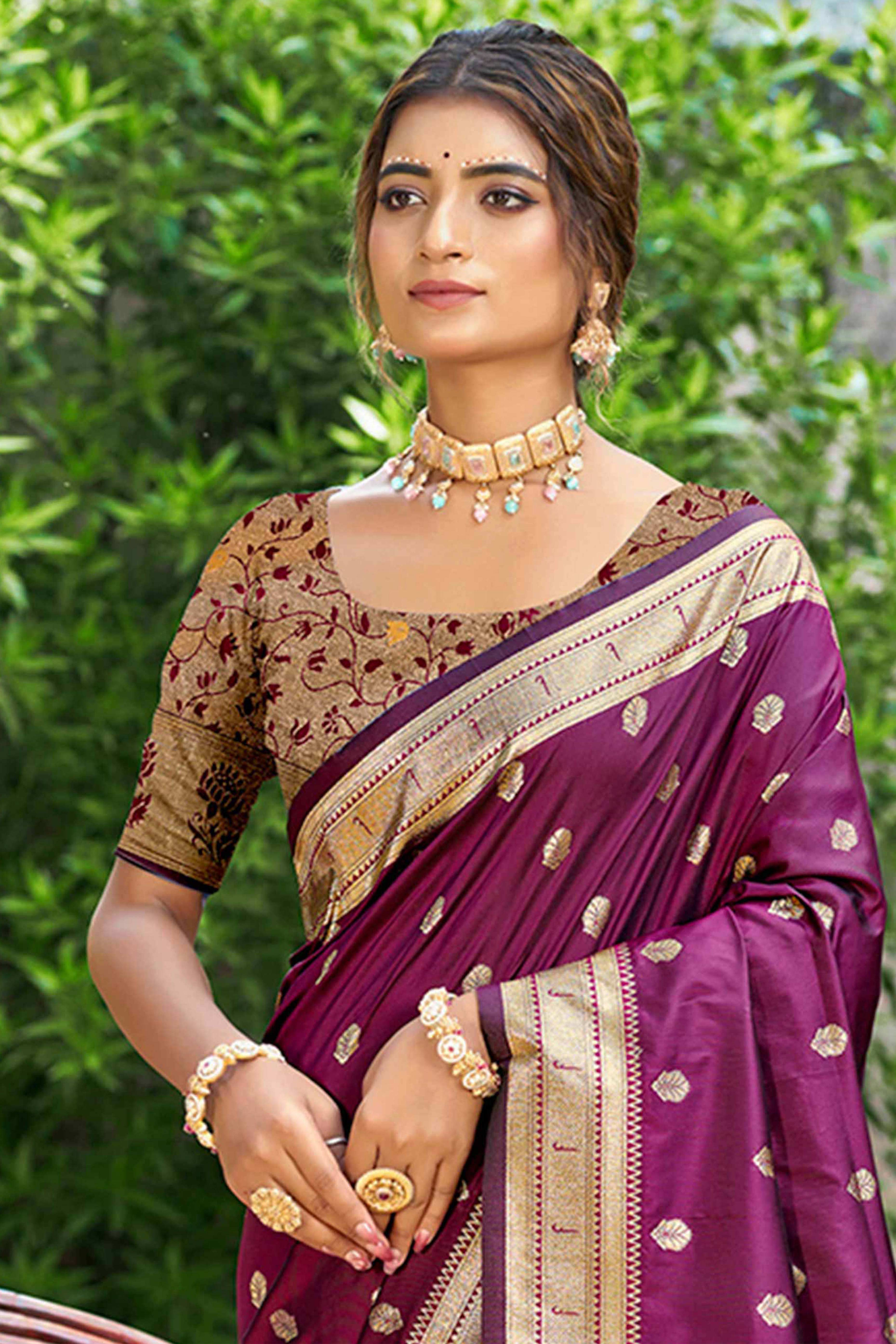 Wine Zari Weaving Silk Blend Saree Adorned With Intricate Peacock Motif Pallu & Graceful Tassel