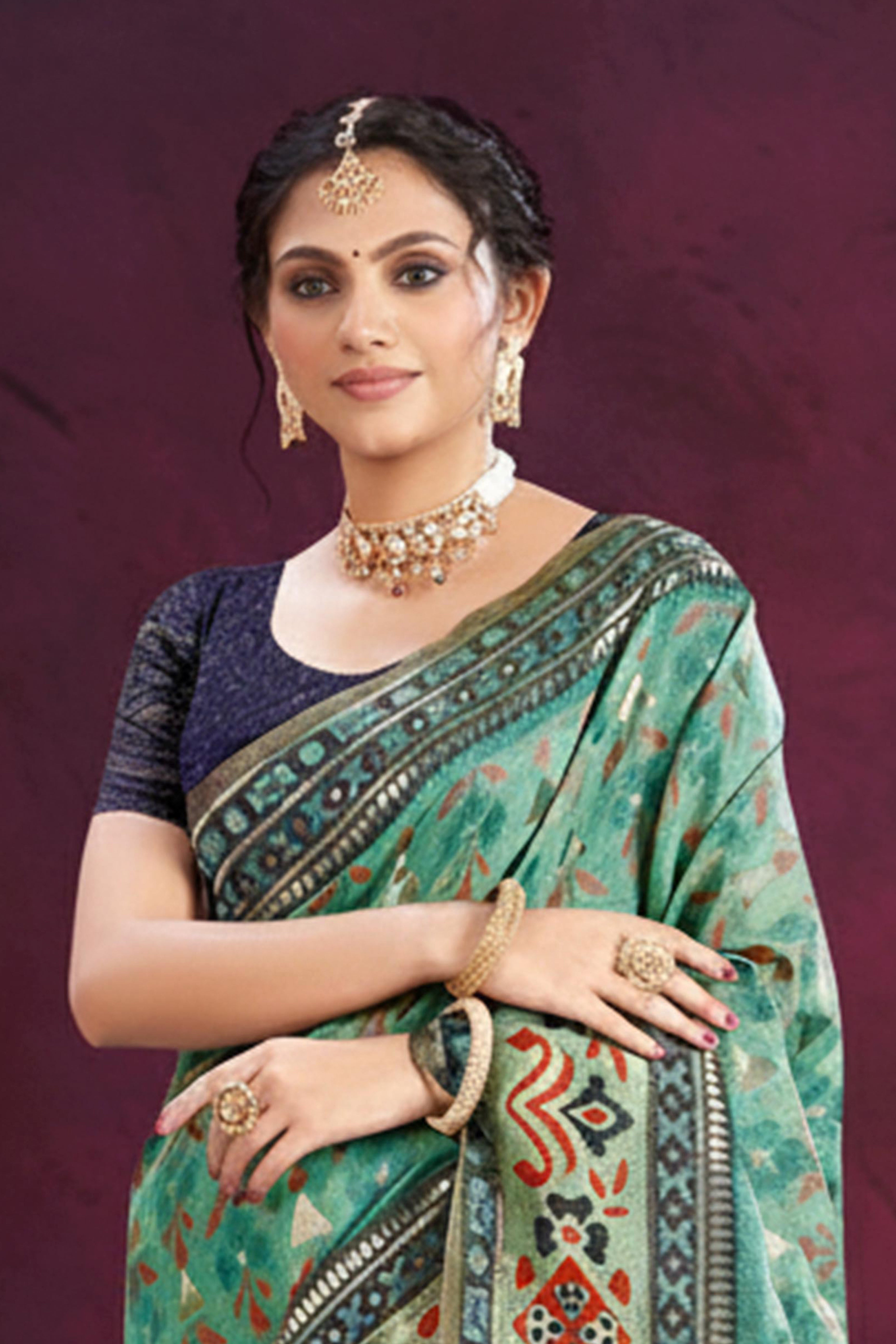 Designer Turquoise Cotton Silk Saree Showcasing Delicate Floral Weaving & Tassel Pallu