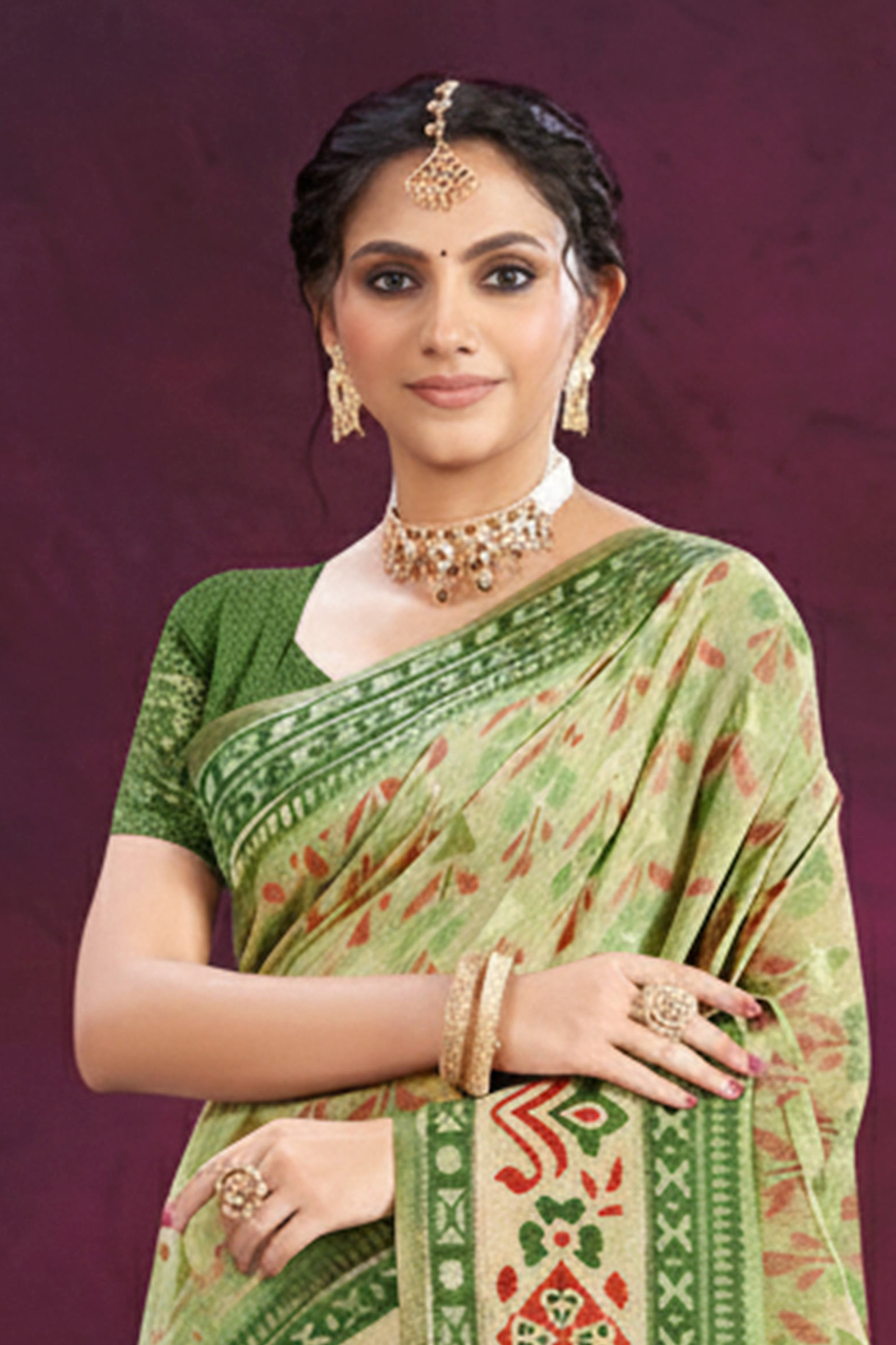 Designer Green Cotton Silk Saree Showcasing Delicate Floral Weaving & Tassel Pallu