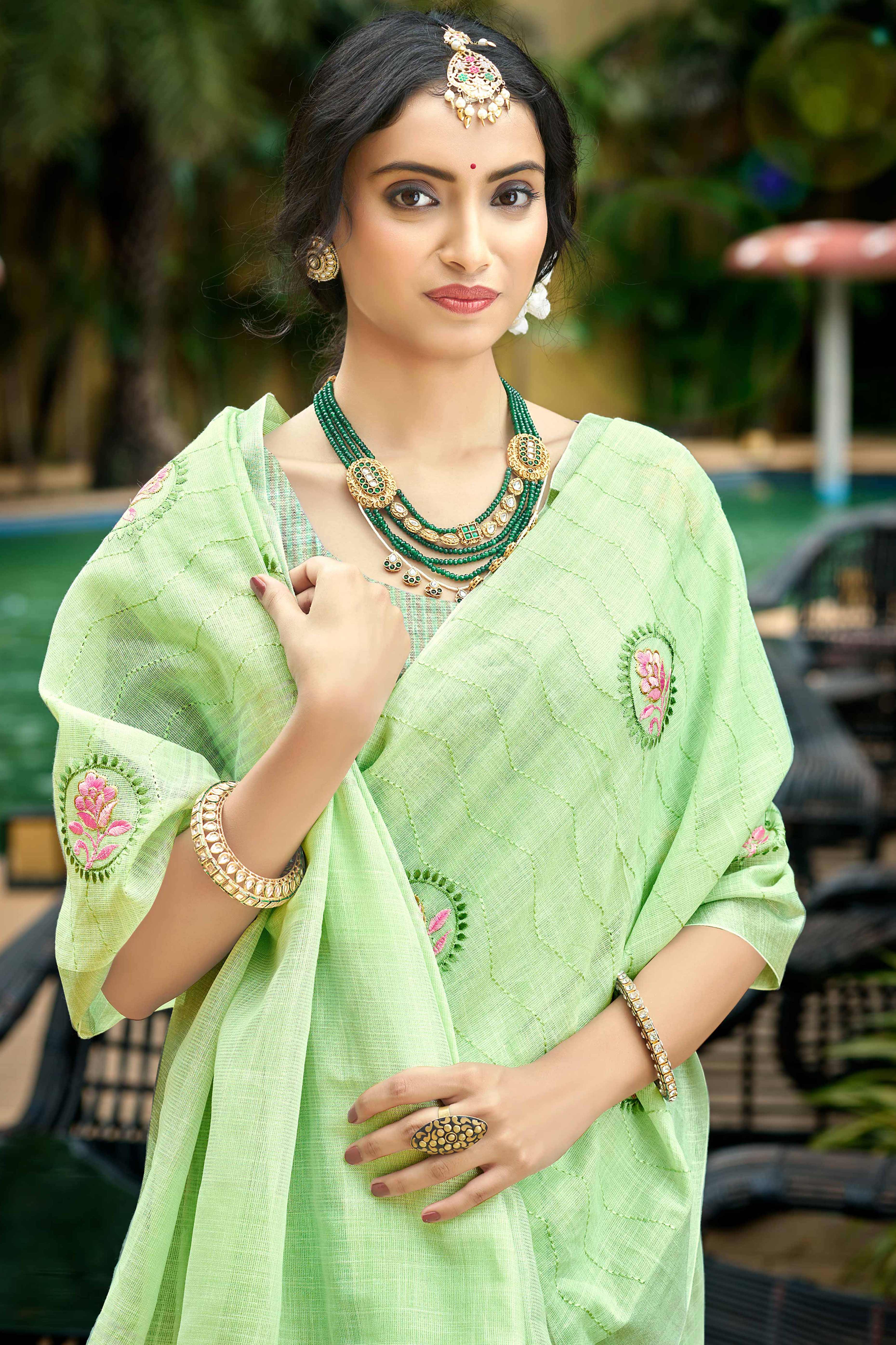 Premium Green Floral Embroidered Linen Saree With Striped Pattern Tassel Pallu