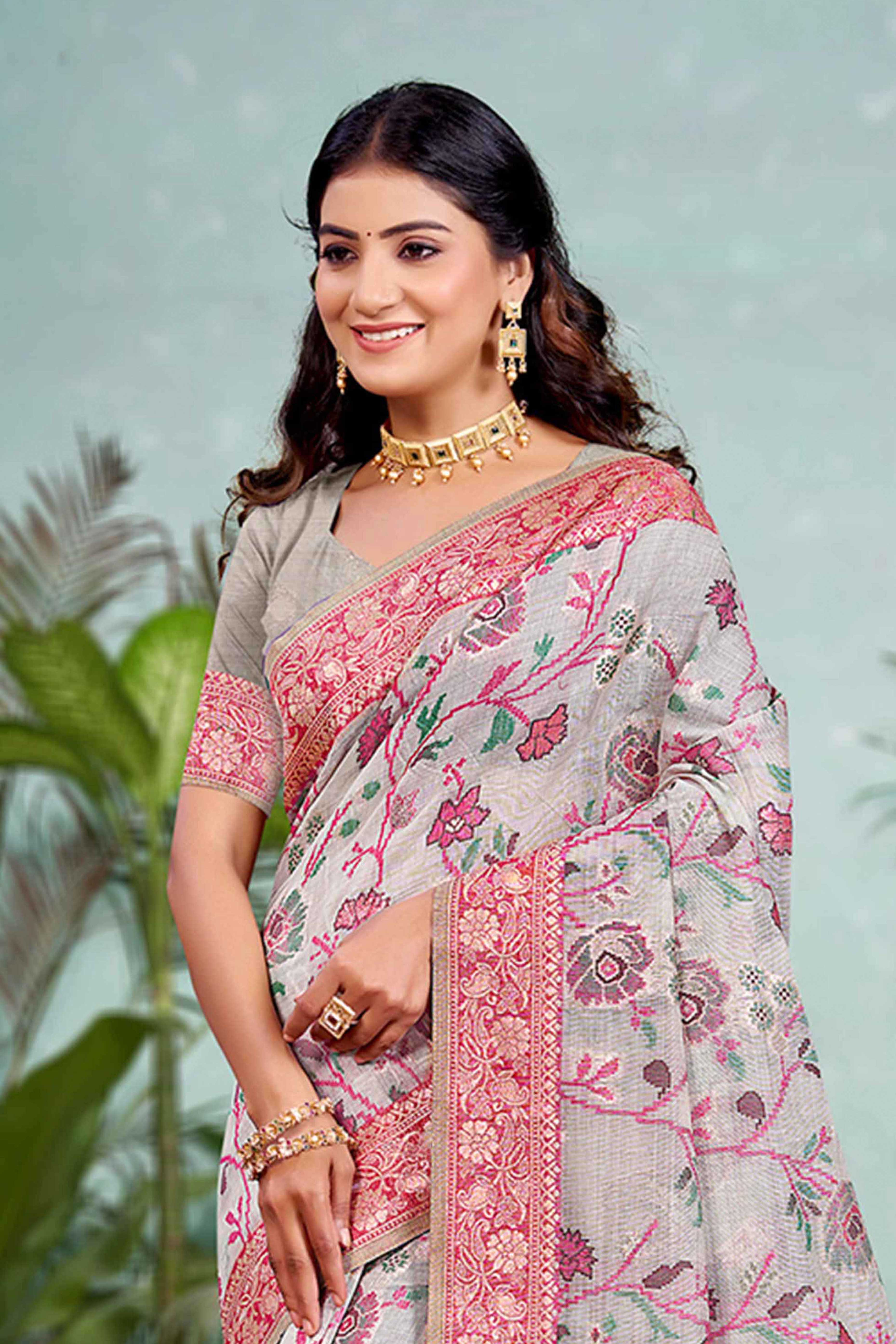 Captivating Grey Floral Zari Weaving Cotton Silk Saree Accented With Tassel Pallu