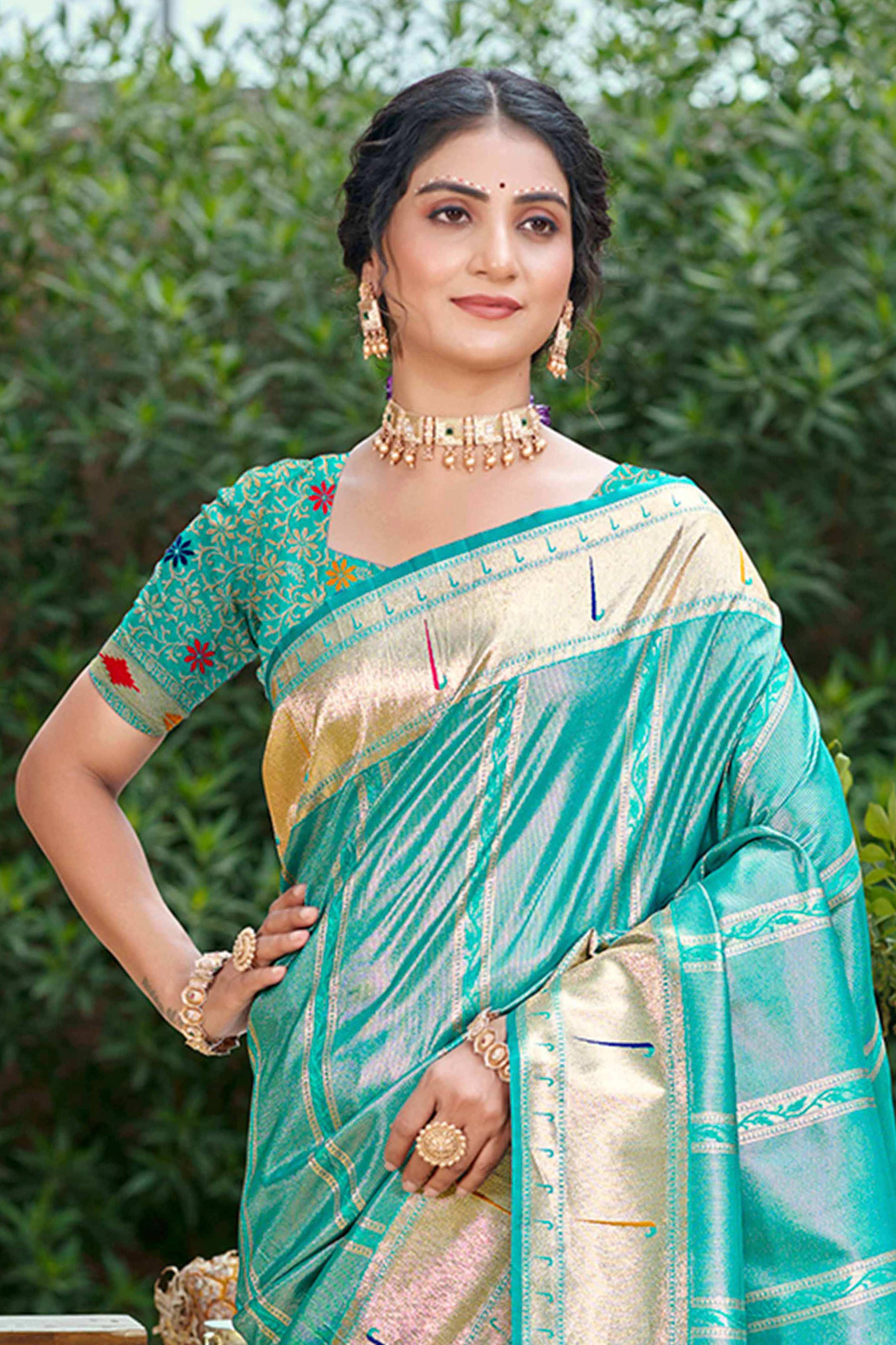 Turquoise Designer Weaving Silk Blend Saree Accented With Graceful Peacock & Floral Motif Pallu