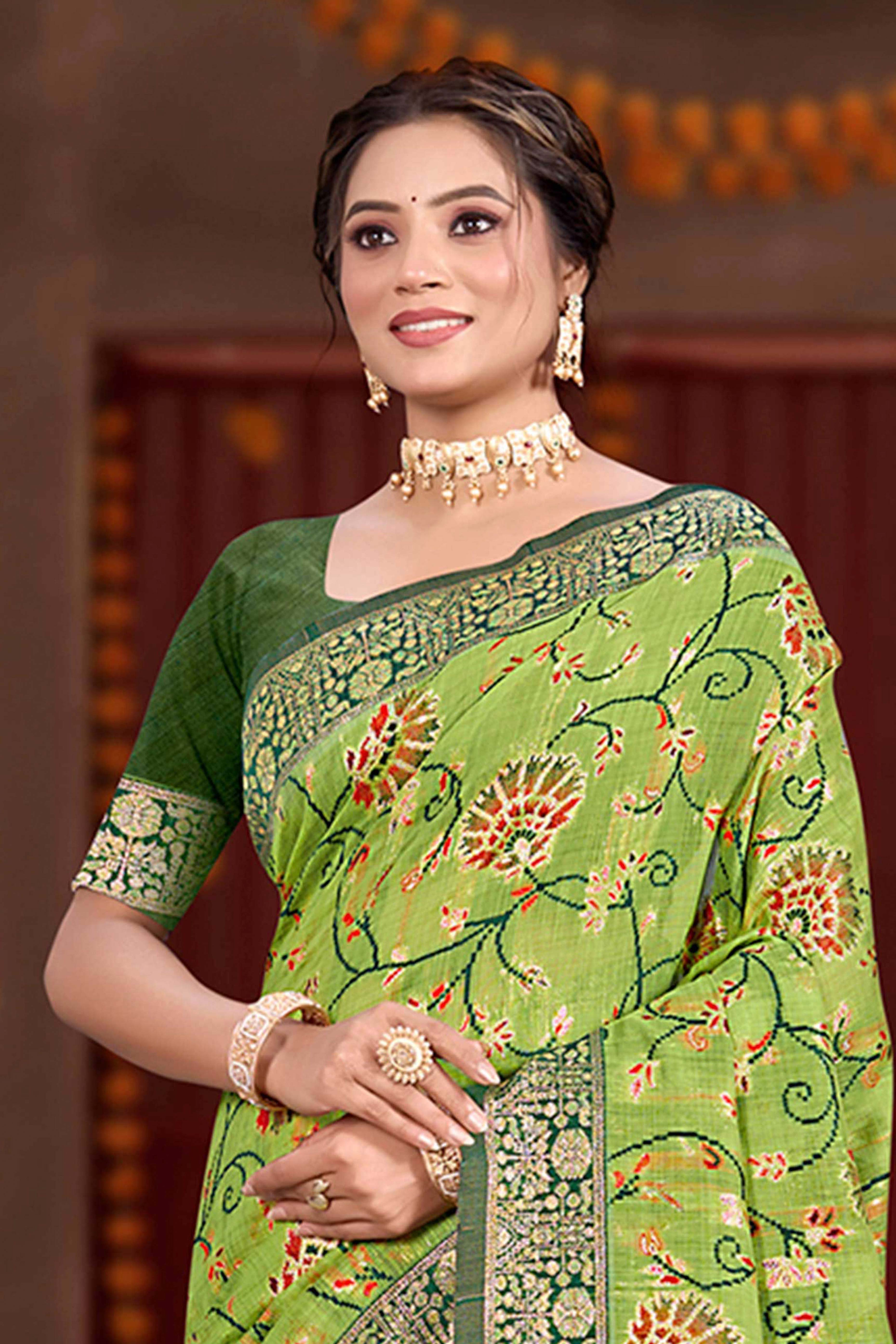 Elegant Green Cotton Silk Saree Adorned With Floral Weaving & Graceful Tassel Pallu