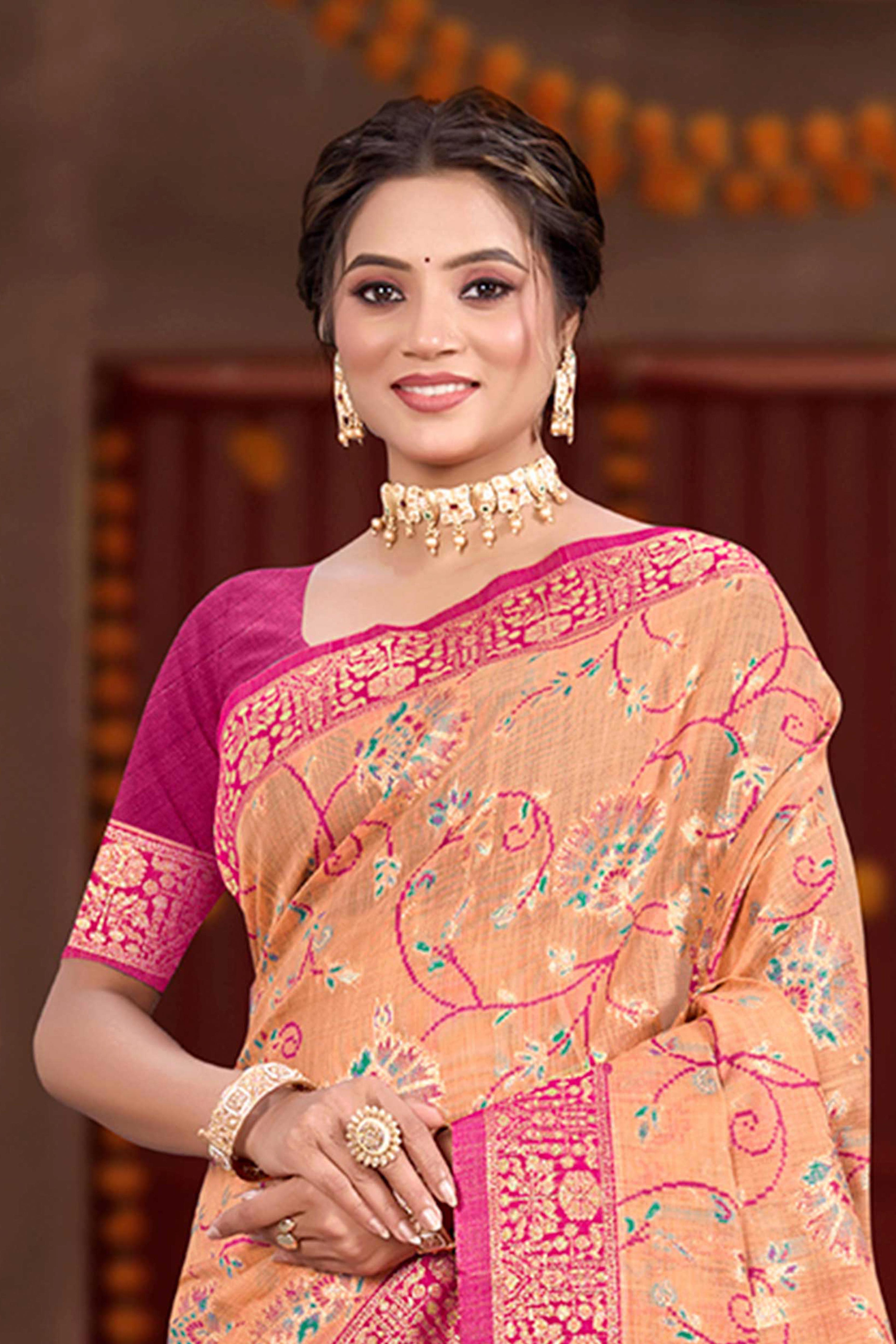 Elegant Light Orange Cotton Silk Saree Adorned With Floral Weaving & Graceful Tassel Pallu