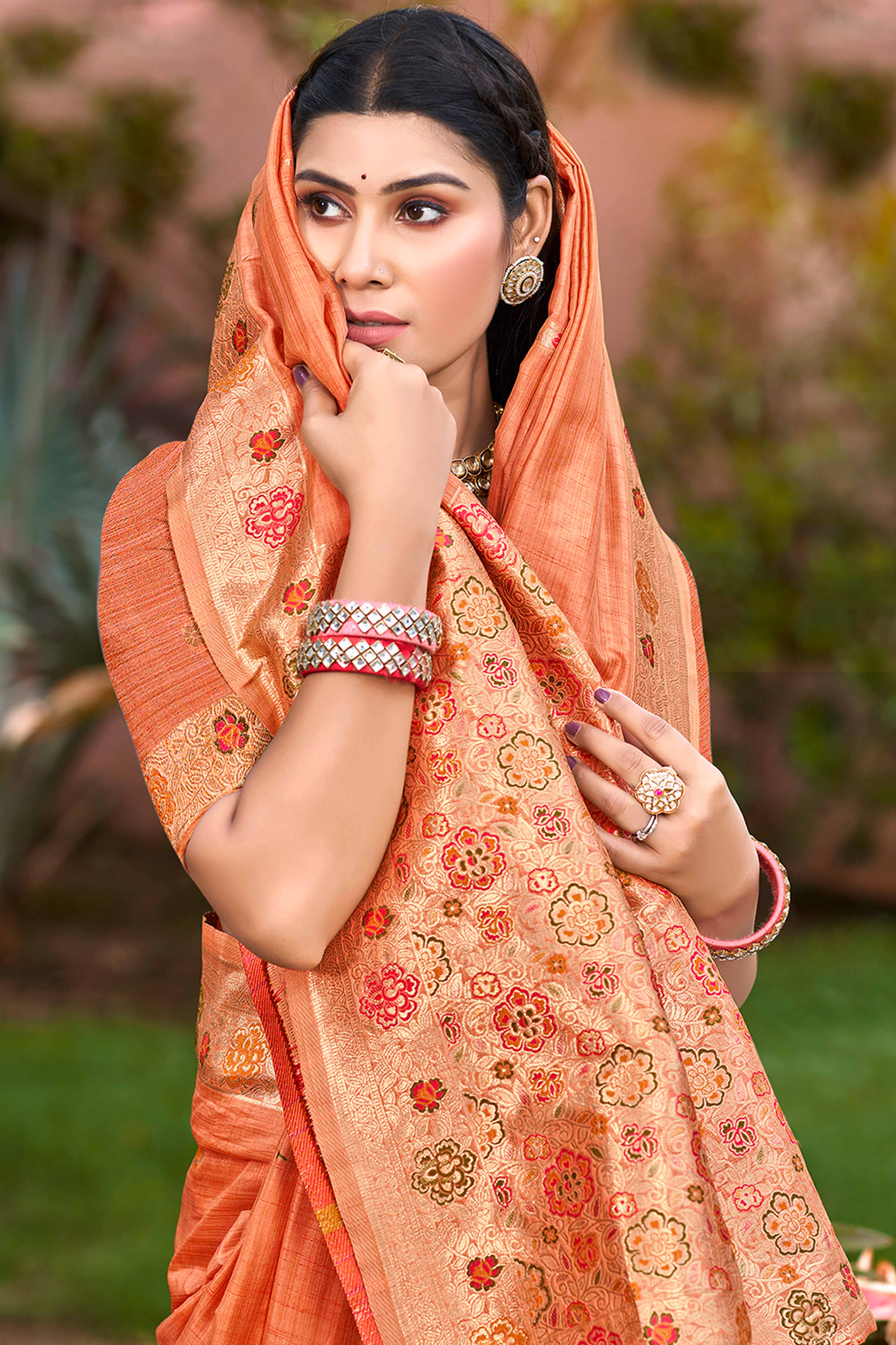 Orange Assam Silk Blend Saree Featuring Intricate Floral Zari Weave & Tassel Pallu