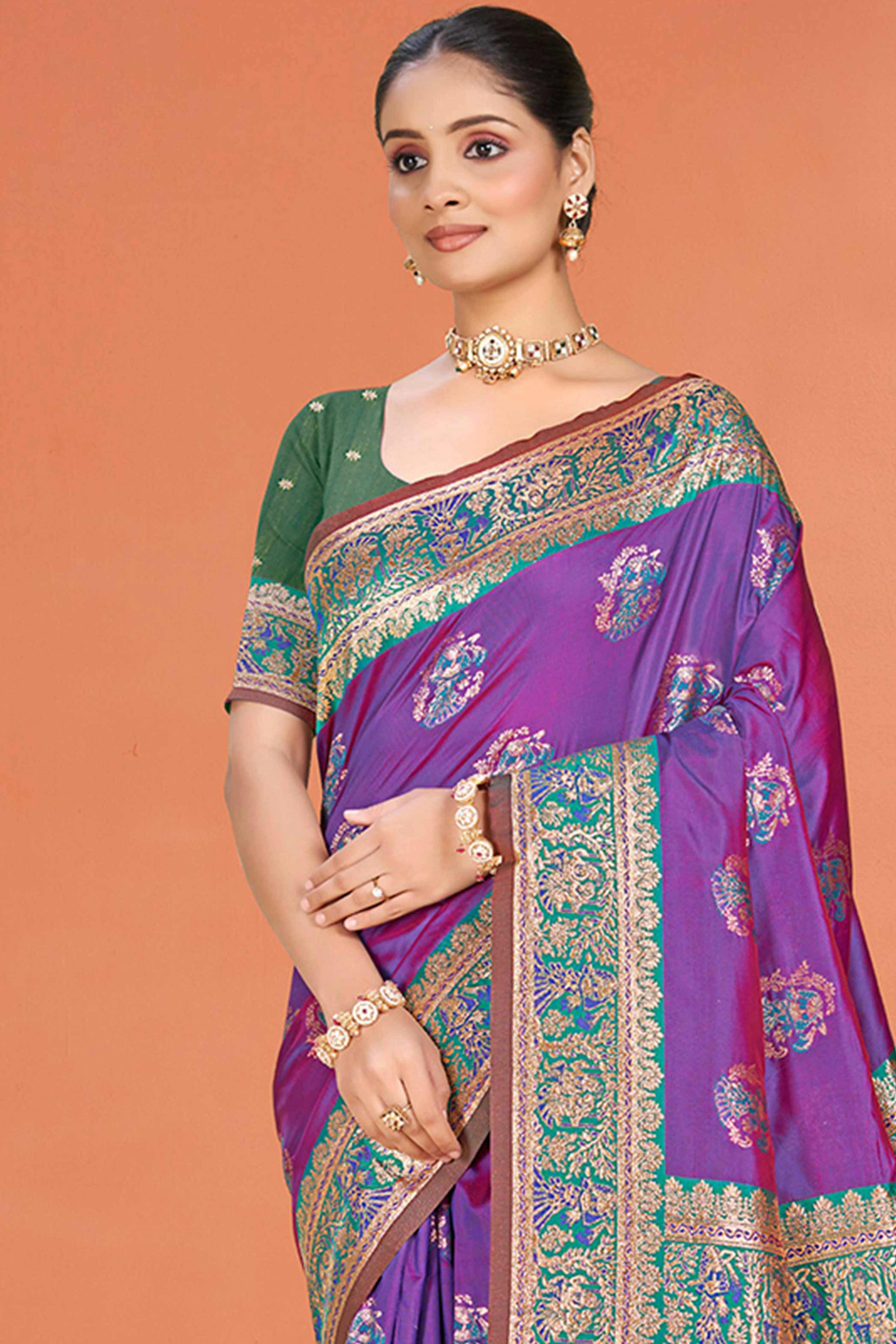 Purple Traditional Zari Weaving Silk Blend Saree Accented With Tassel Pallu