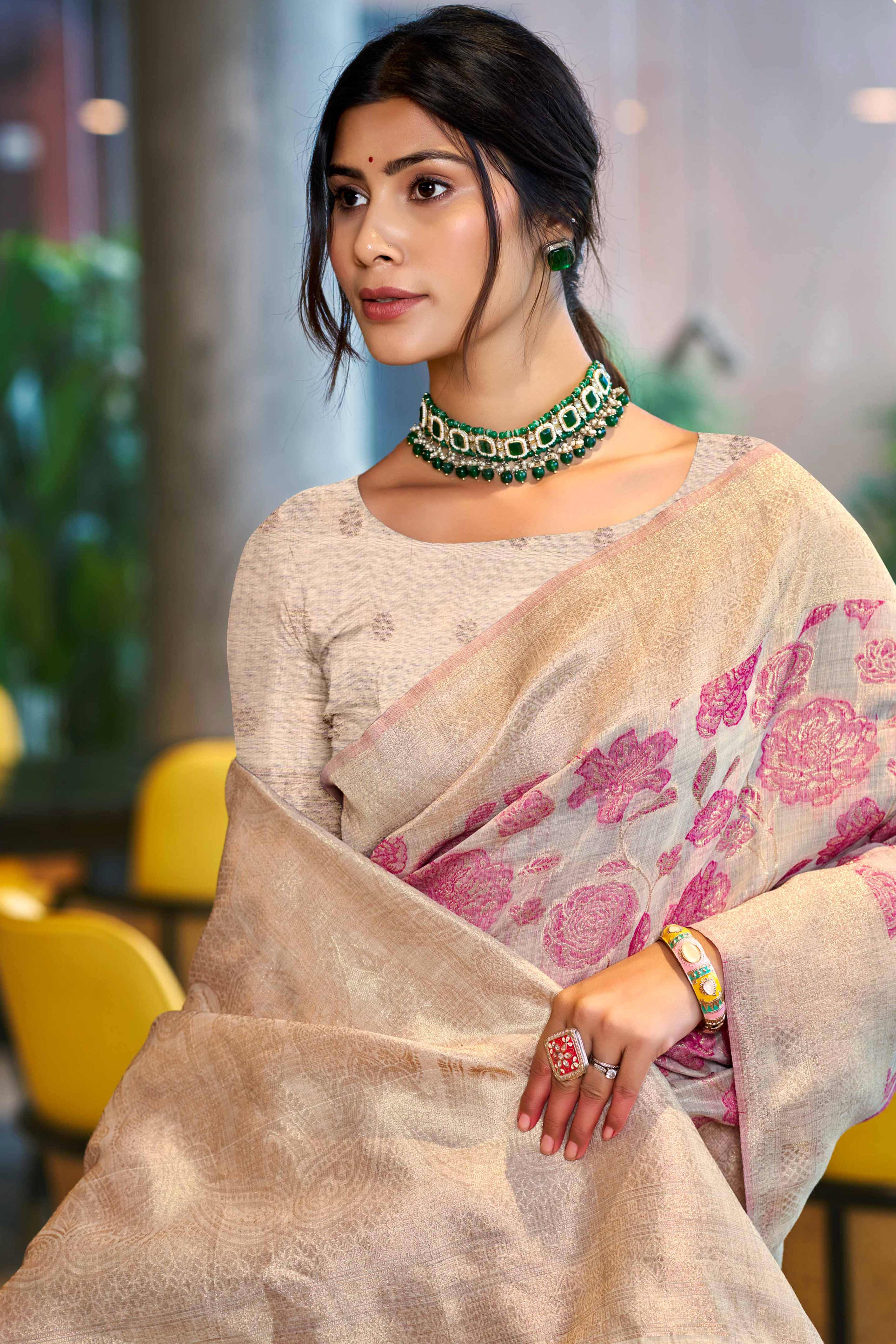 Pink Premium Cotton Silk Saree Highlighted With Floral Weaving Work & Tassel Pallu