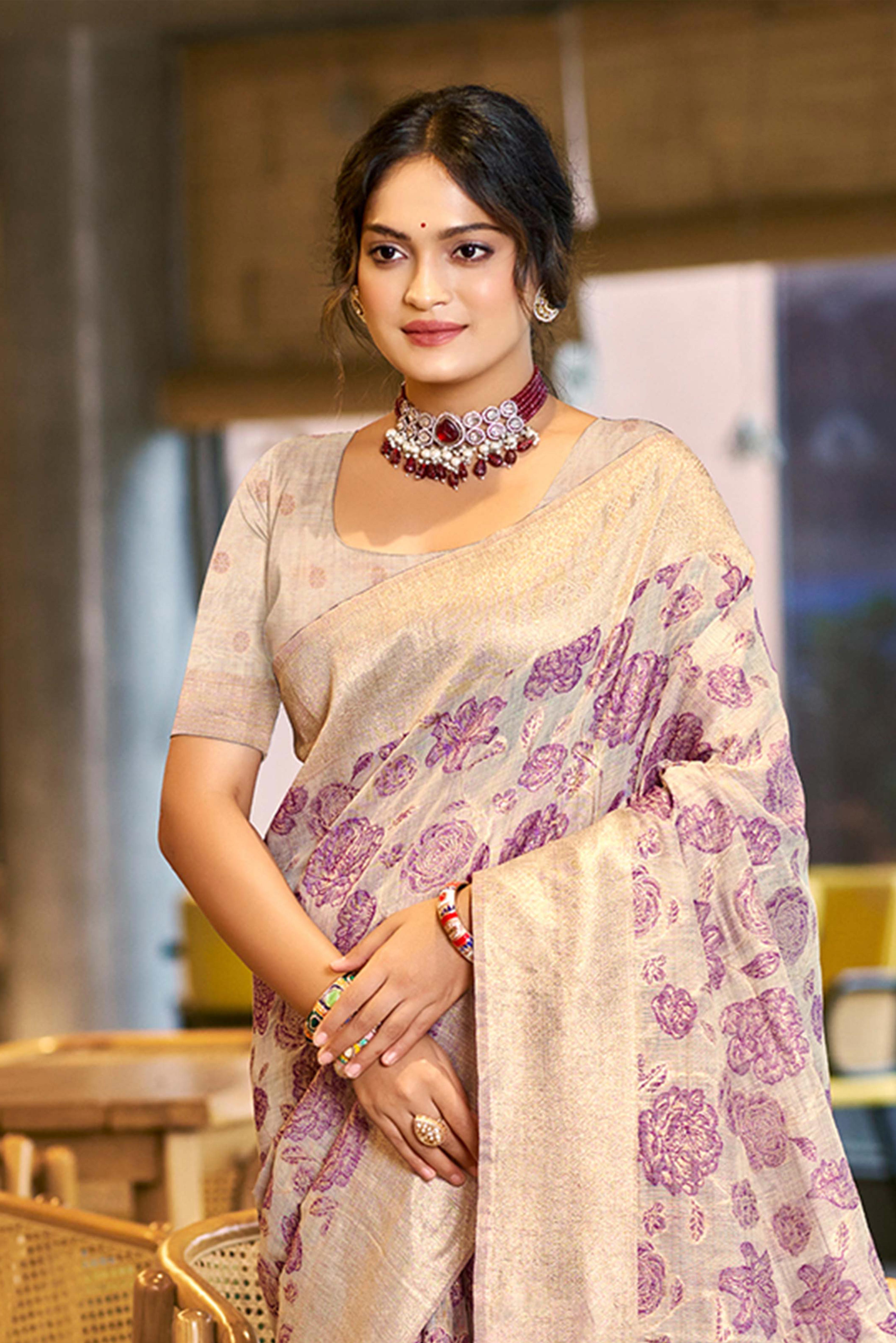 Purple Premium Cotton Silk Saree Highlighted With Floral Weaving Work & Tassel Pallu