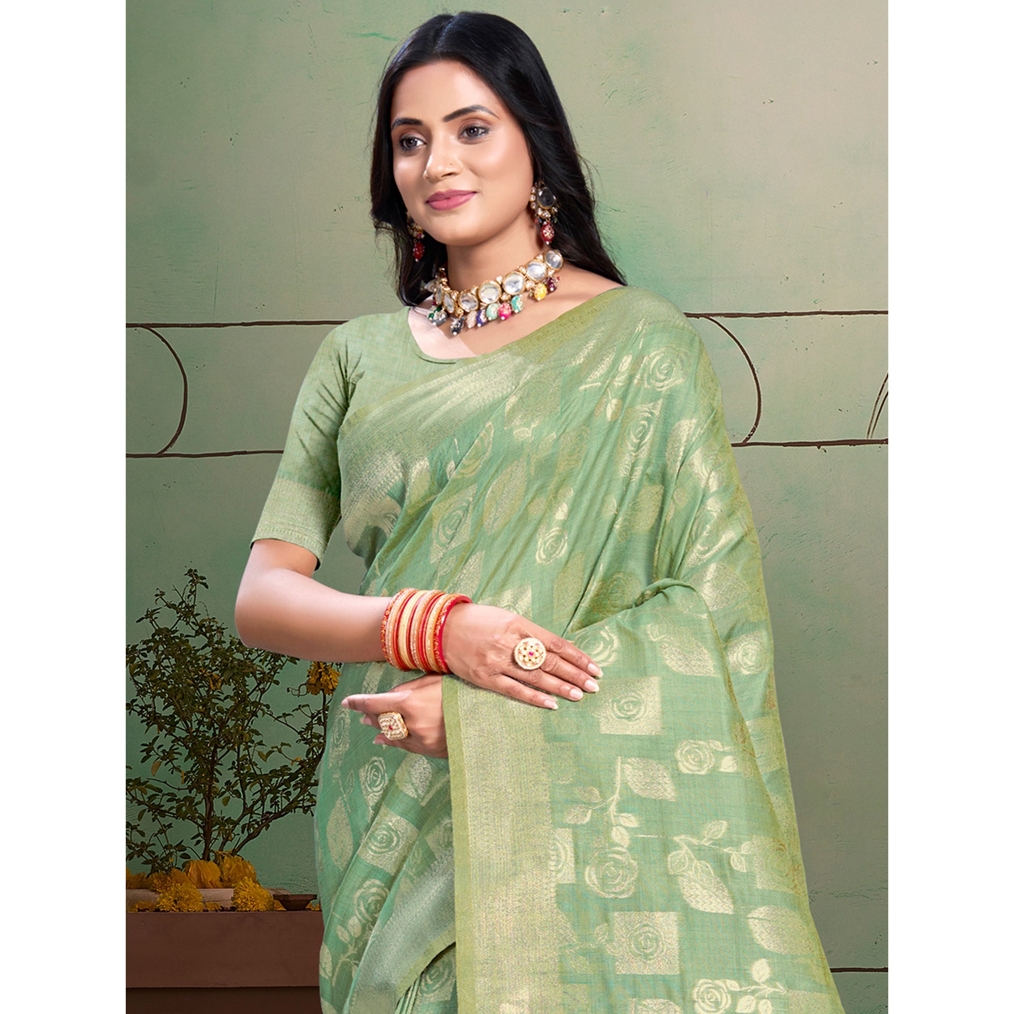 Sea Green Floral Woven Cotton Silk Saree With Tassels