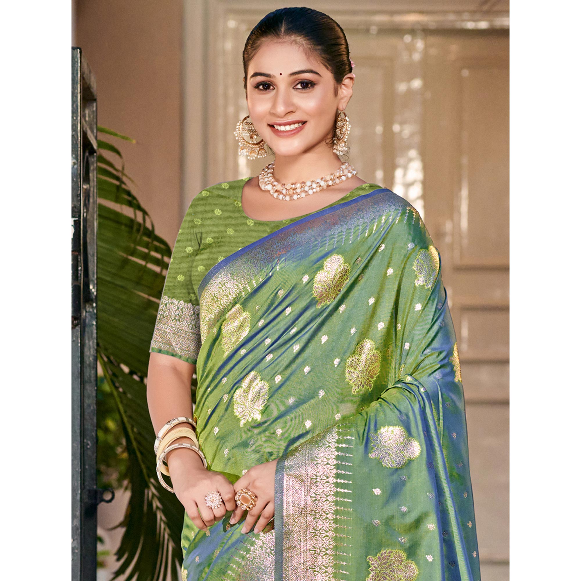 Green Floral Woven Banarasi Silk Saree With Tassels