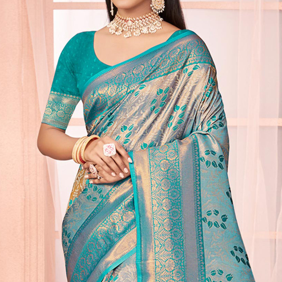 Turquoise Floral Woven Kanjivaram Silk Saree With Tassels