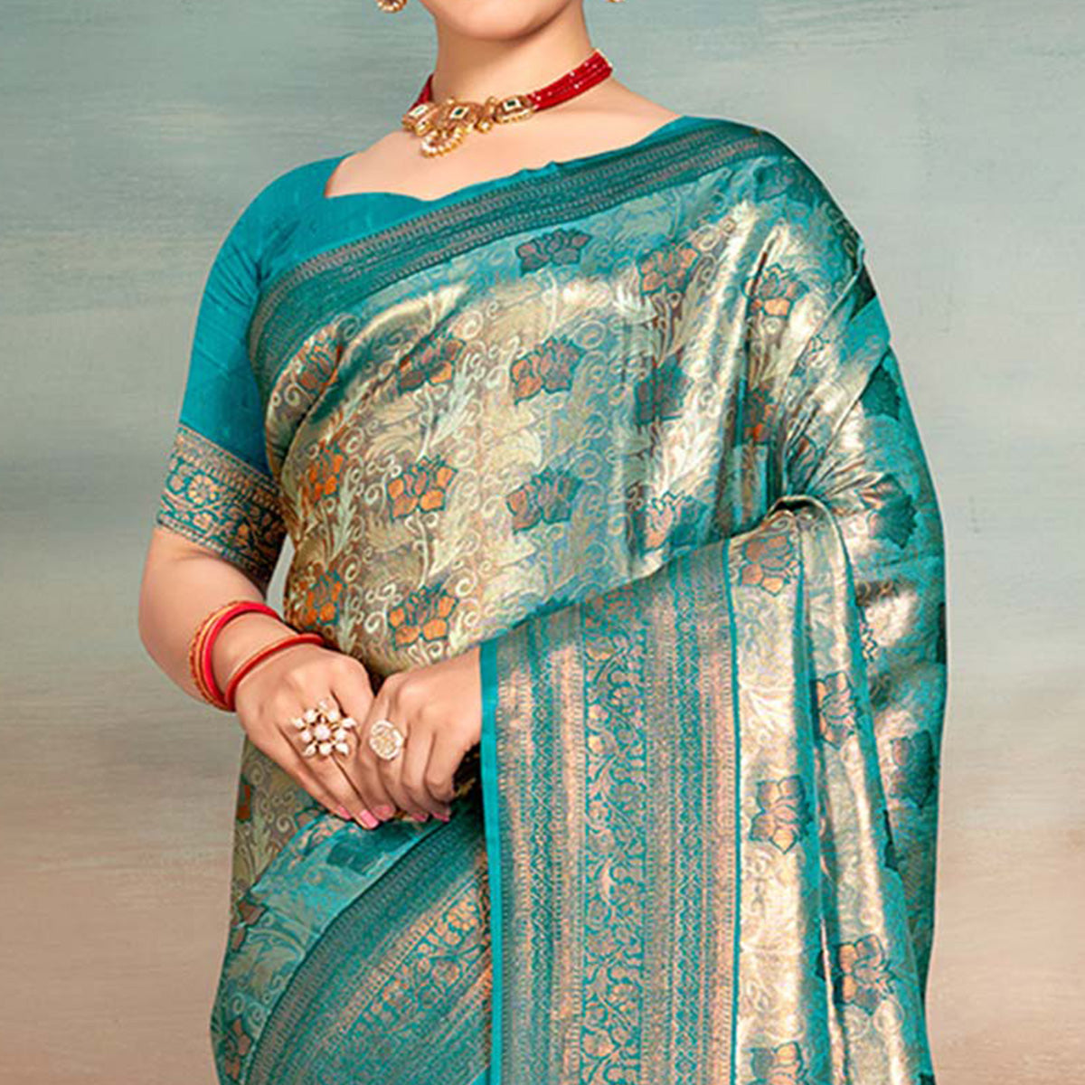 Turquoise Floral Woven Kanjivaram Silk Saree With Tassels
