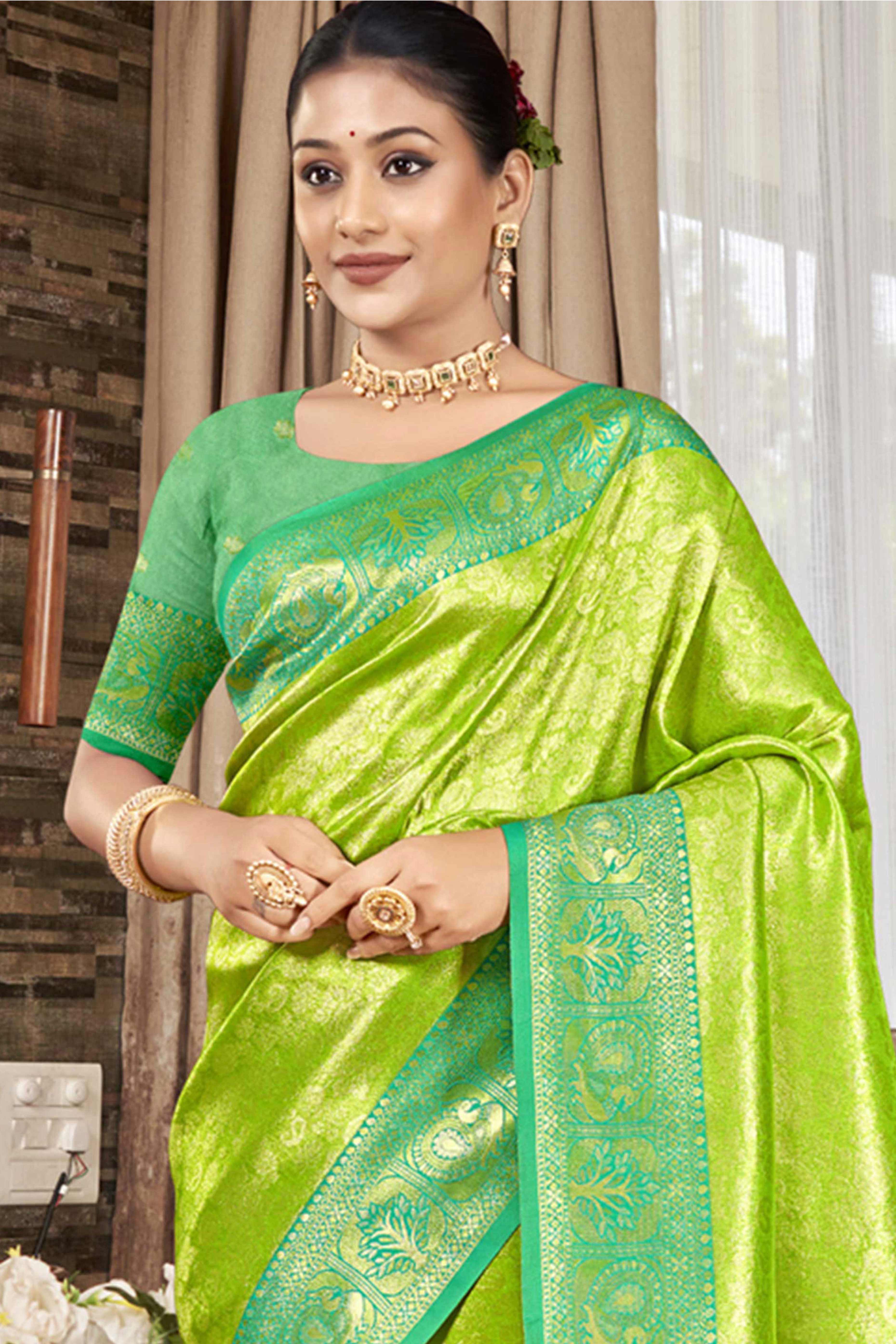 Premium Green Floral and Peacock Motif Woven Kanjivaram Silk Saree With Tassel Pallu