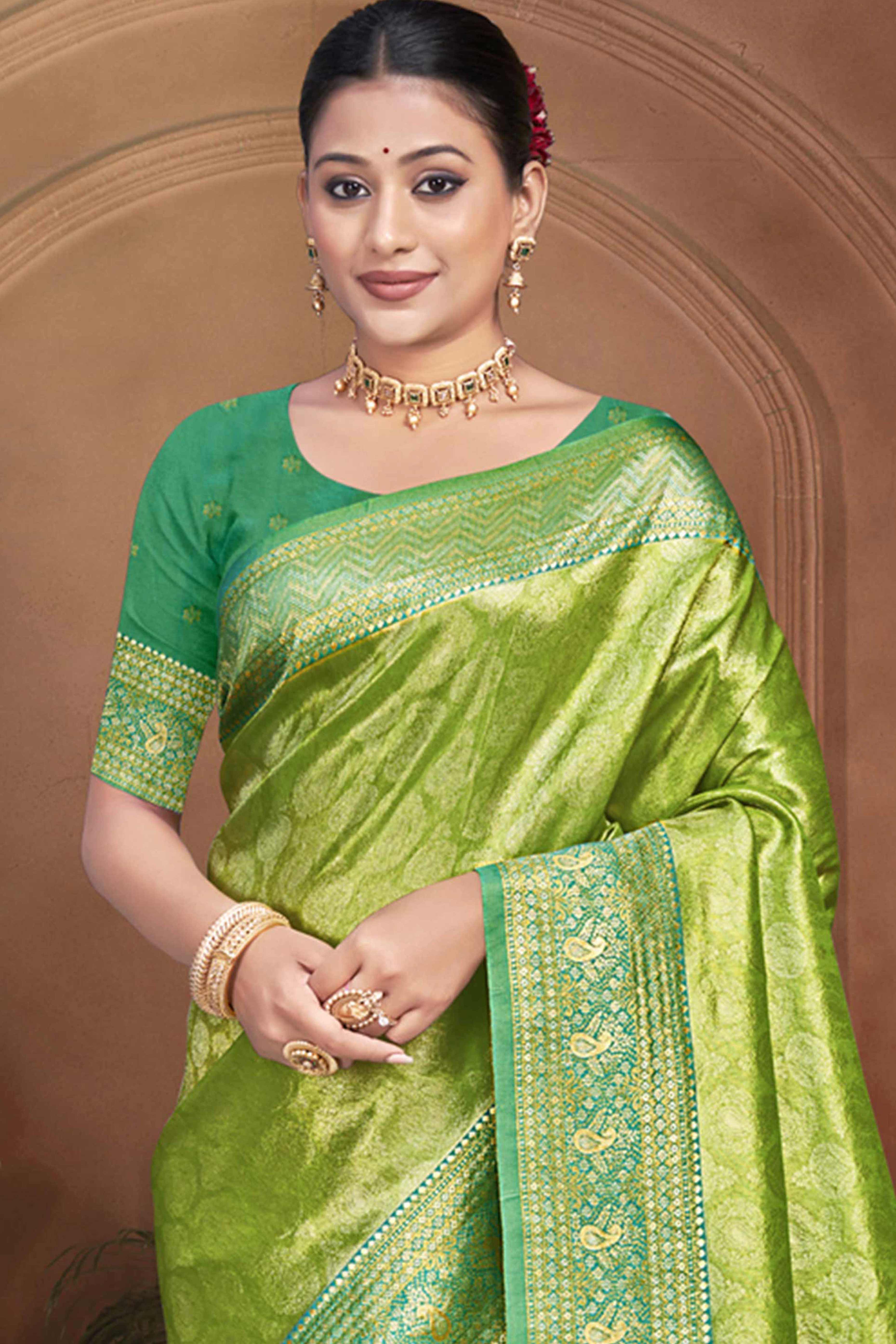 Exclusive Green Paisley & Floral Pattern Weaving Kanjivaram Silk Saree With Tassel Pallu