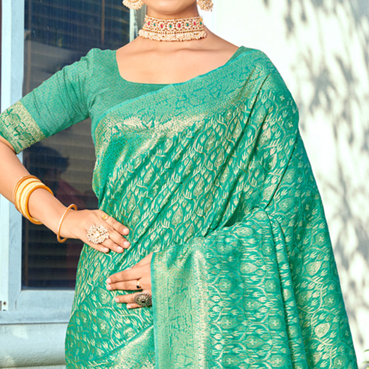 Sea Green Floral Woven Cotton Blend Saree With Tassels