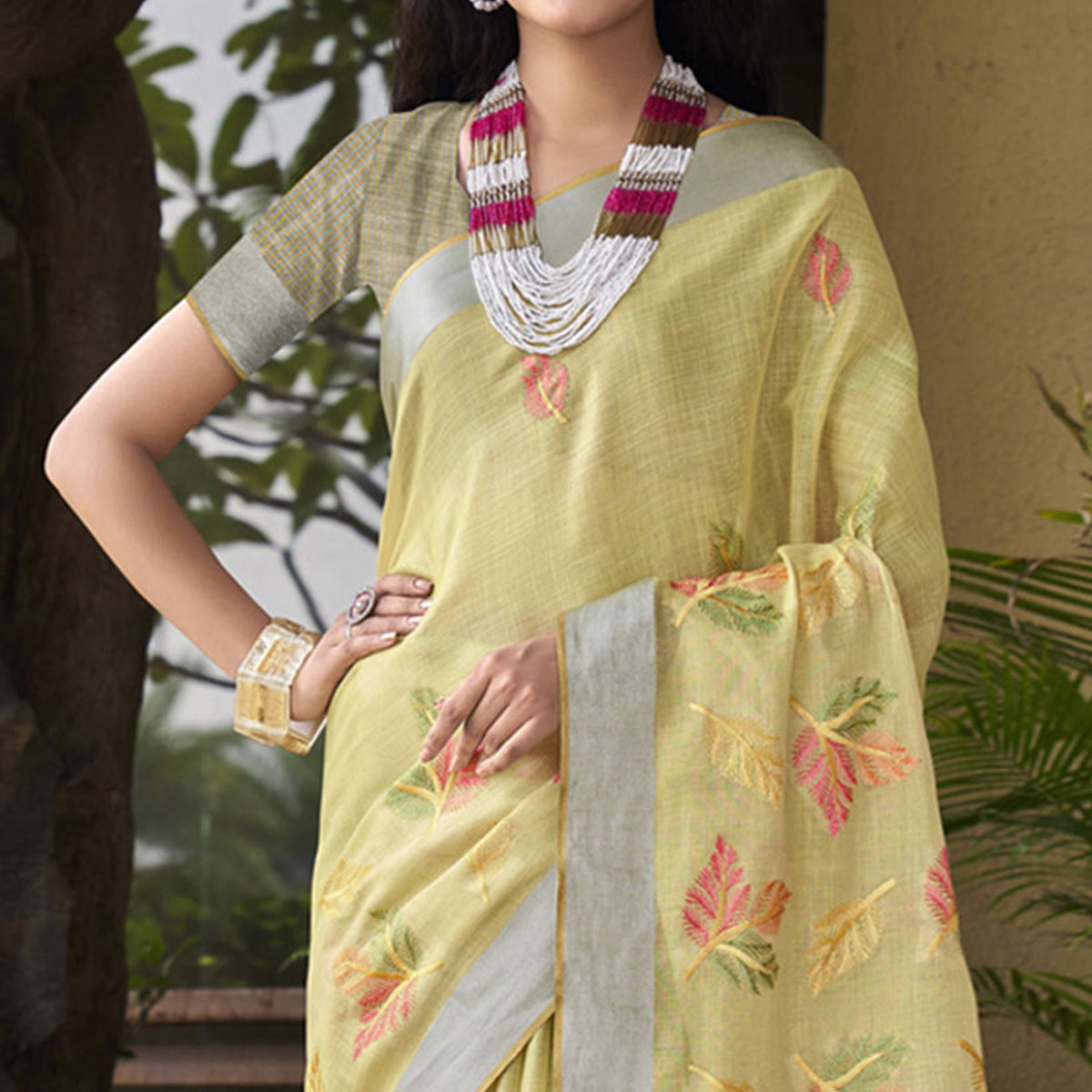 Yellow Floral Embroidered Linen Saree With Tassels