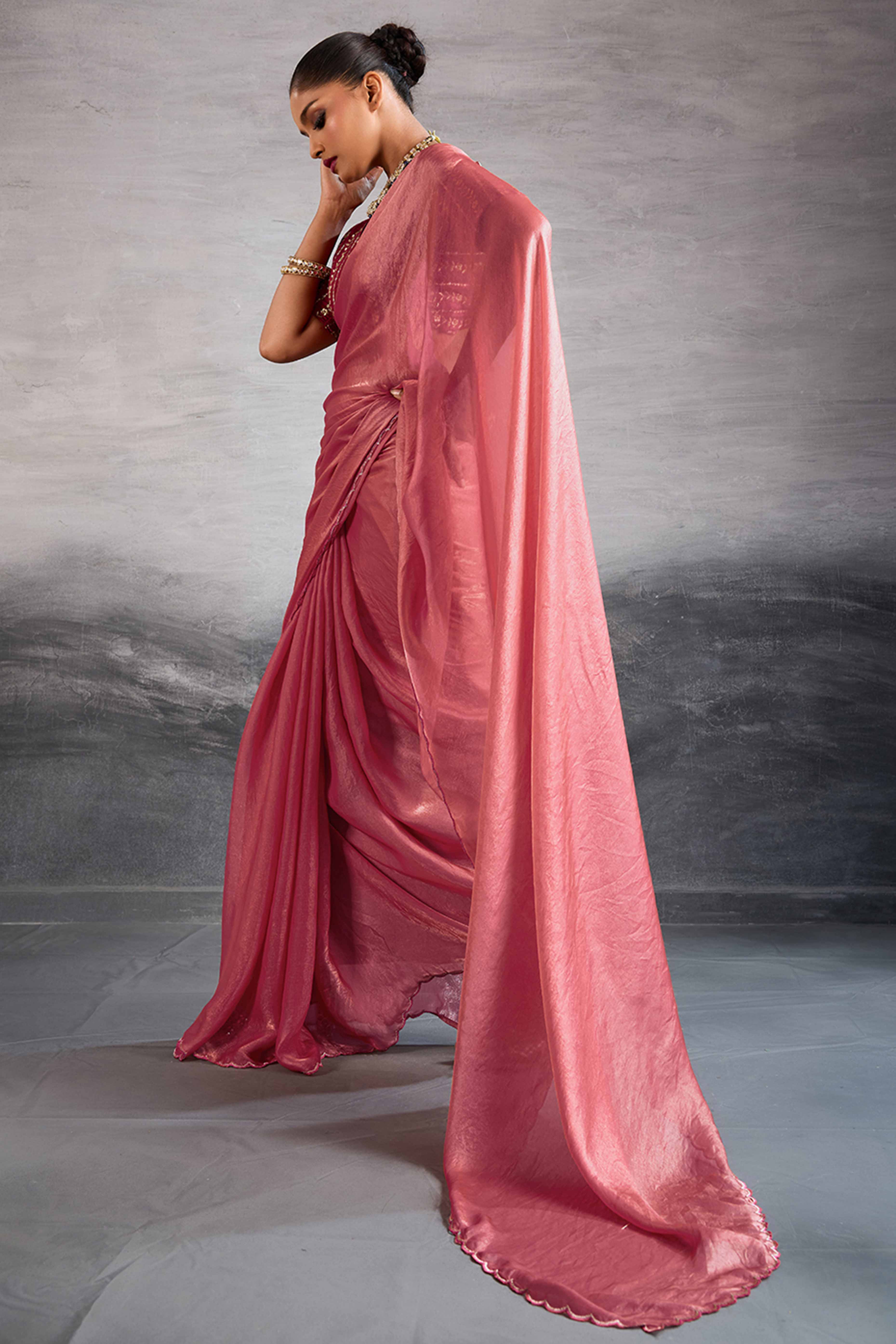 Coral Pink Solid Organza Jimmy Choo Saree Accentuated With Elegant Cutwork Border Detailing