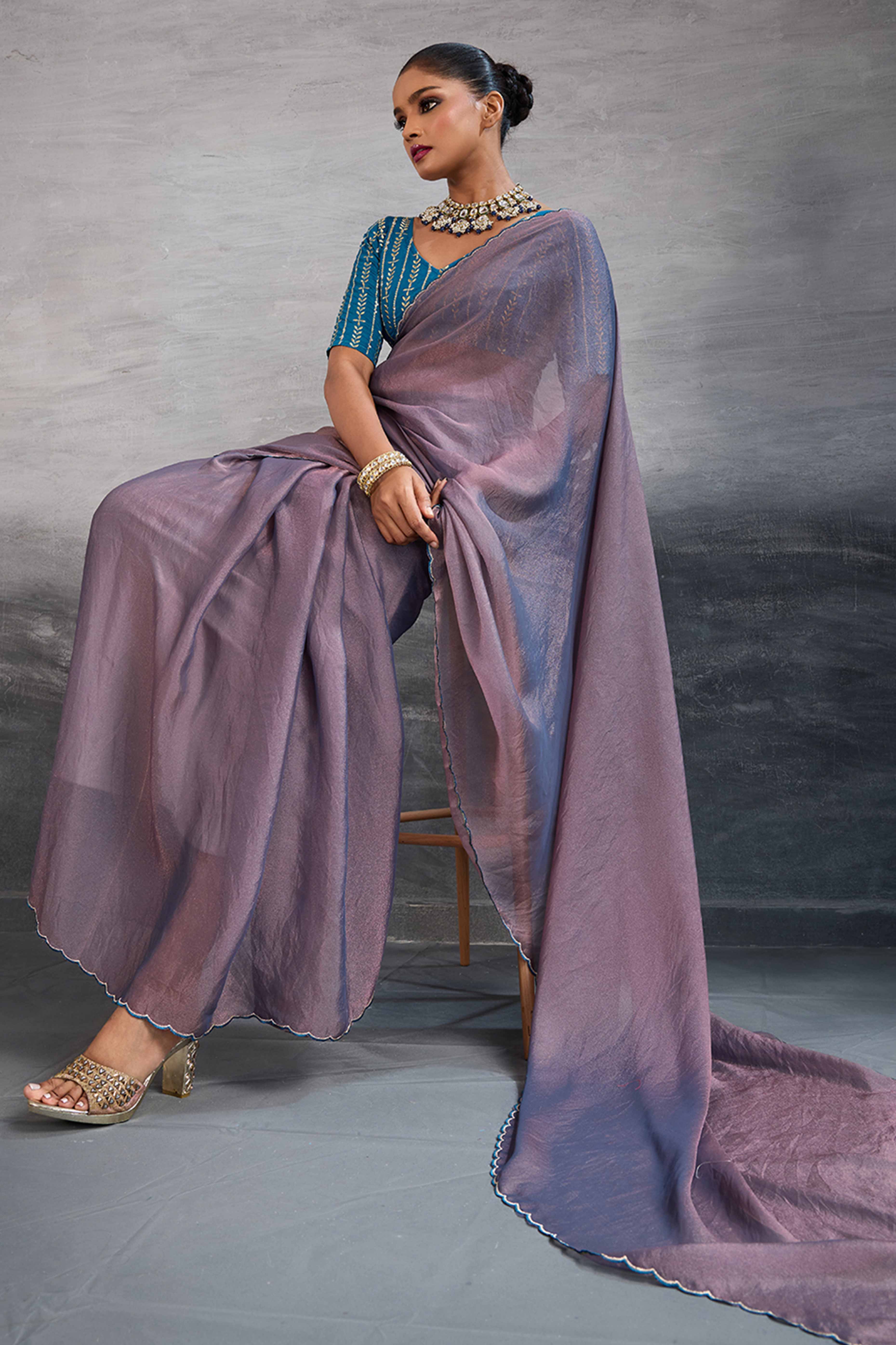 Mauve Solid Organza Jimmy Choo Saree Accentuated With Elegant Cutwork Border Detailing