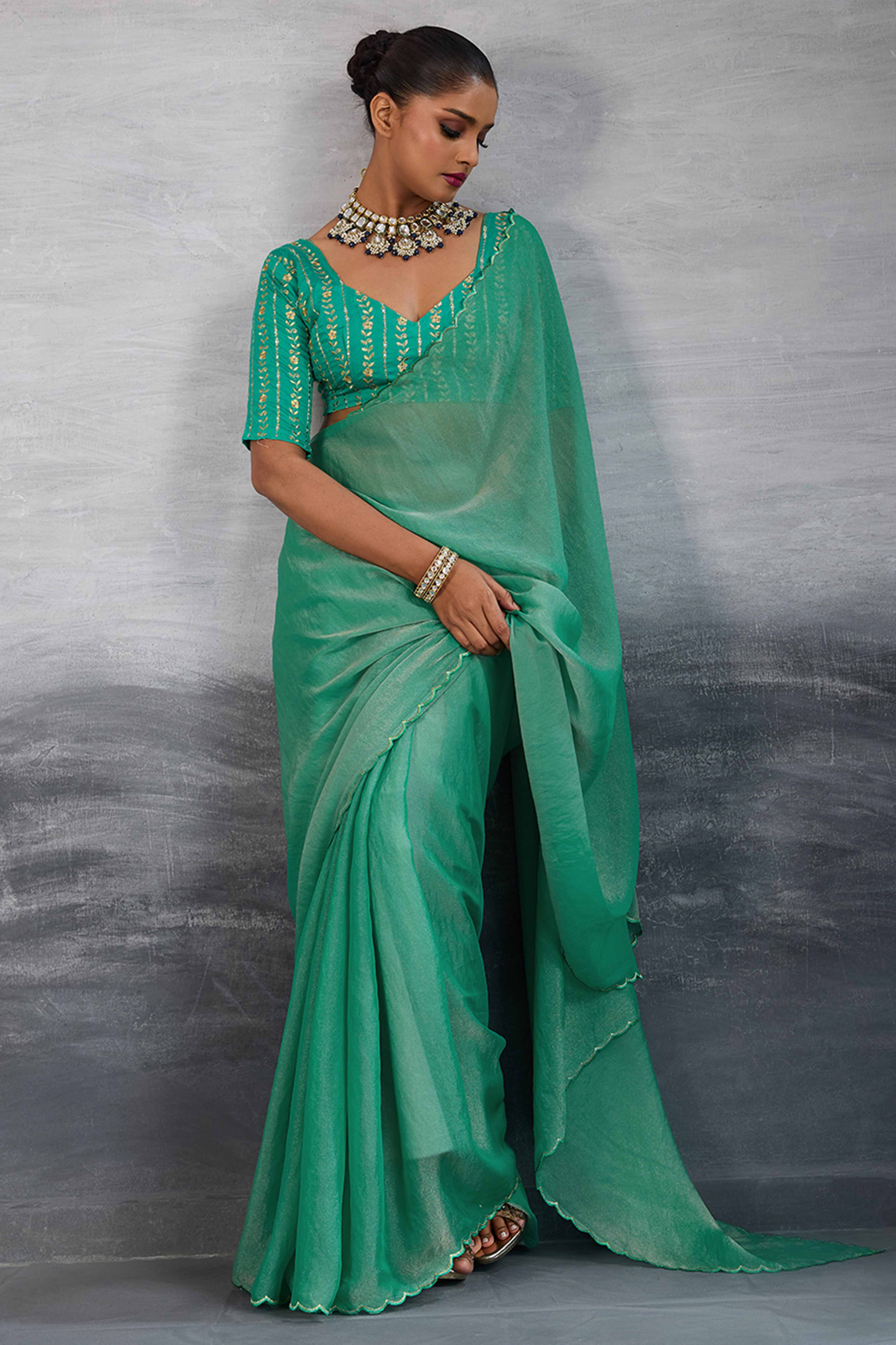 Green Solid Organza Jimmy Choo Saree Accentuated With Elegant Cutwork Border Detailing
