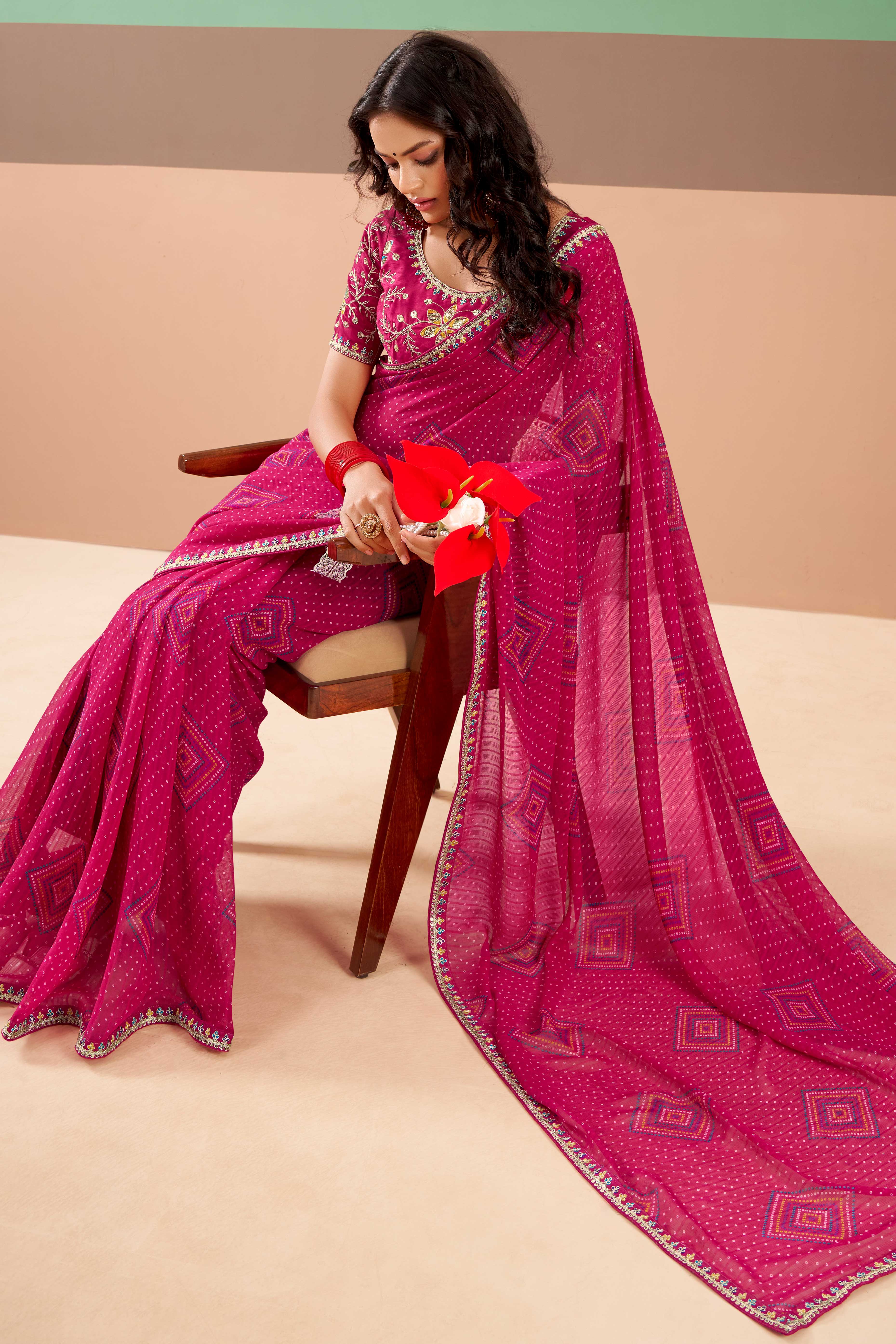 Charming Pink Bandhani Printed Georgette Saree Adorned With Intricate Cording Embroidered Border