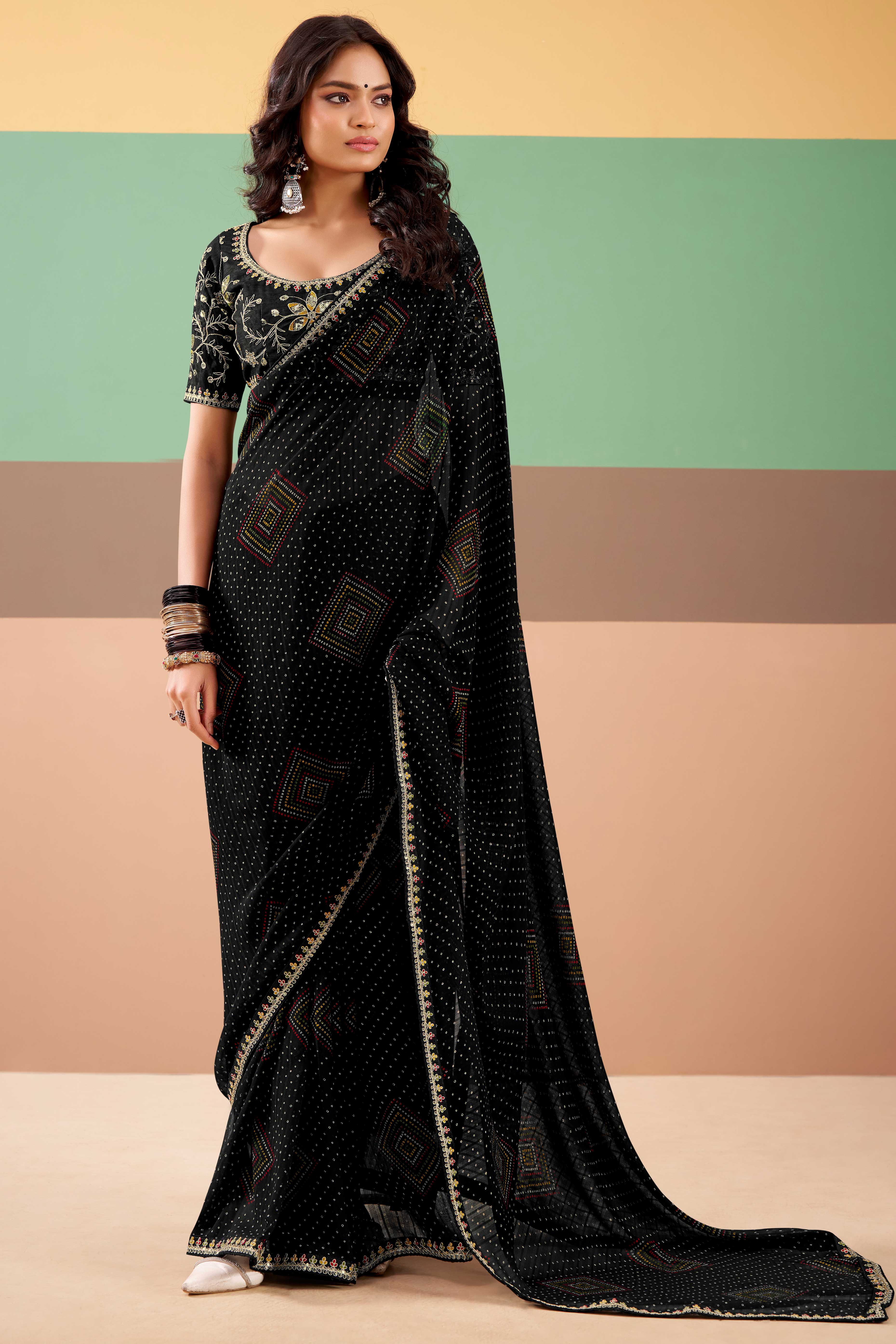 Charming Black Bandhani Printed Georgette Saree Adorned With Intricate Cording Embroidered Border