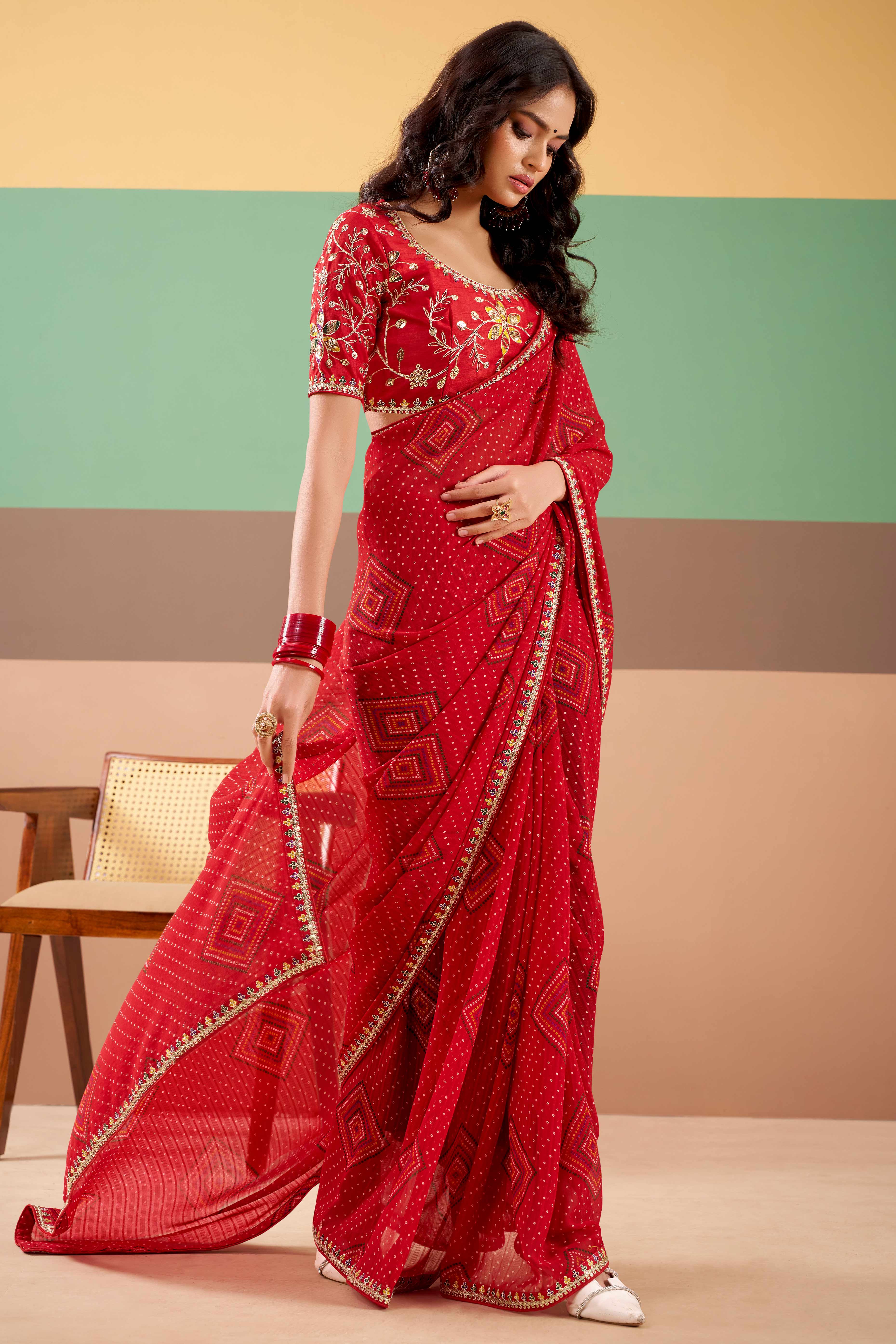 Charming Red Bandhani Printed Georgette Saree Adorned With Intricate Cording Embroidered Border