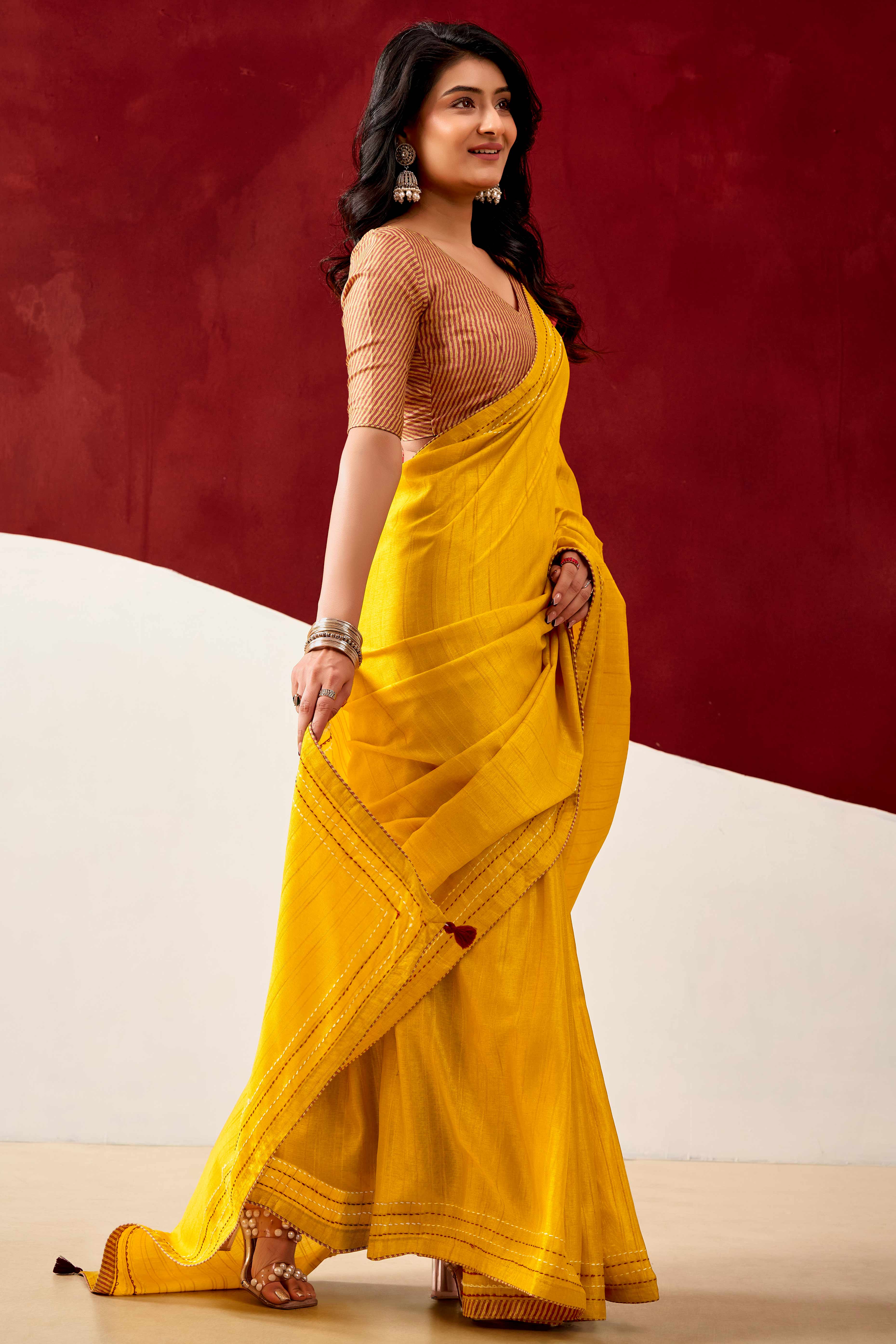 Graceful Yellow Handloom Cotton Blend Saree Featuring Striped Lining Embroidery & Tassel Pallu