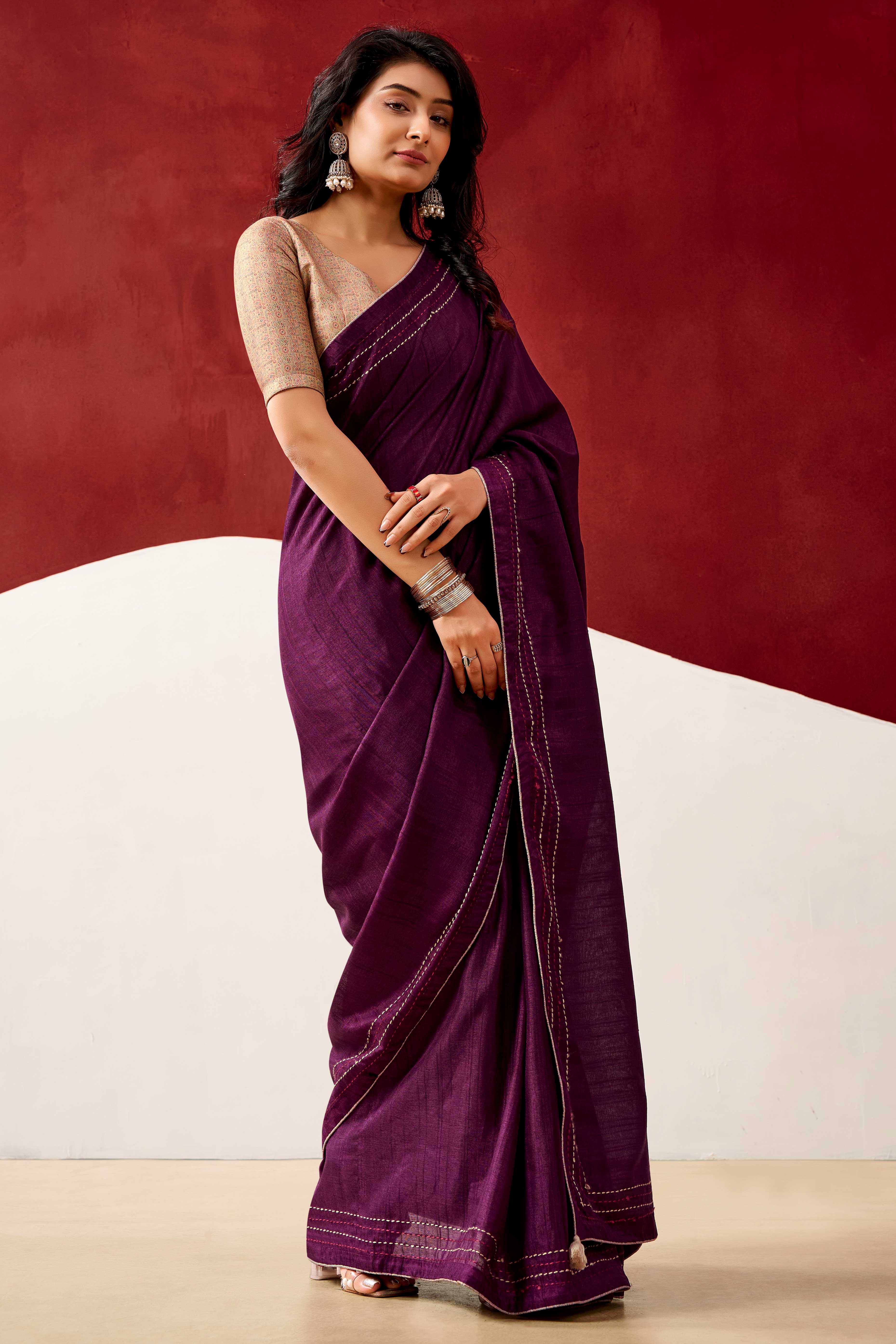 Graceful Wine Handloom Cotton Blend Saree Featuring Striped Lining Embroidery & Tassel Pallu