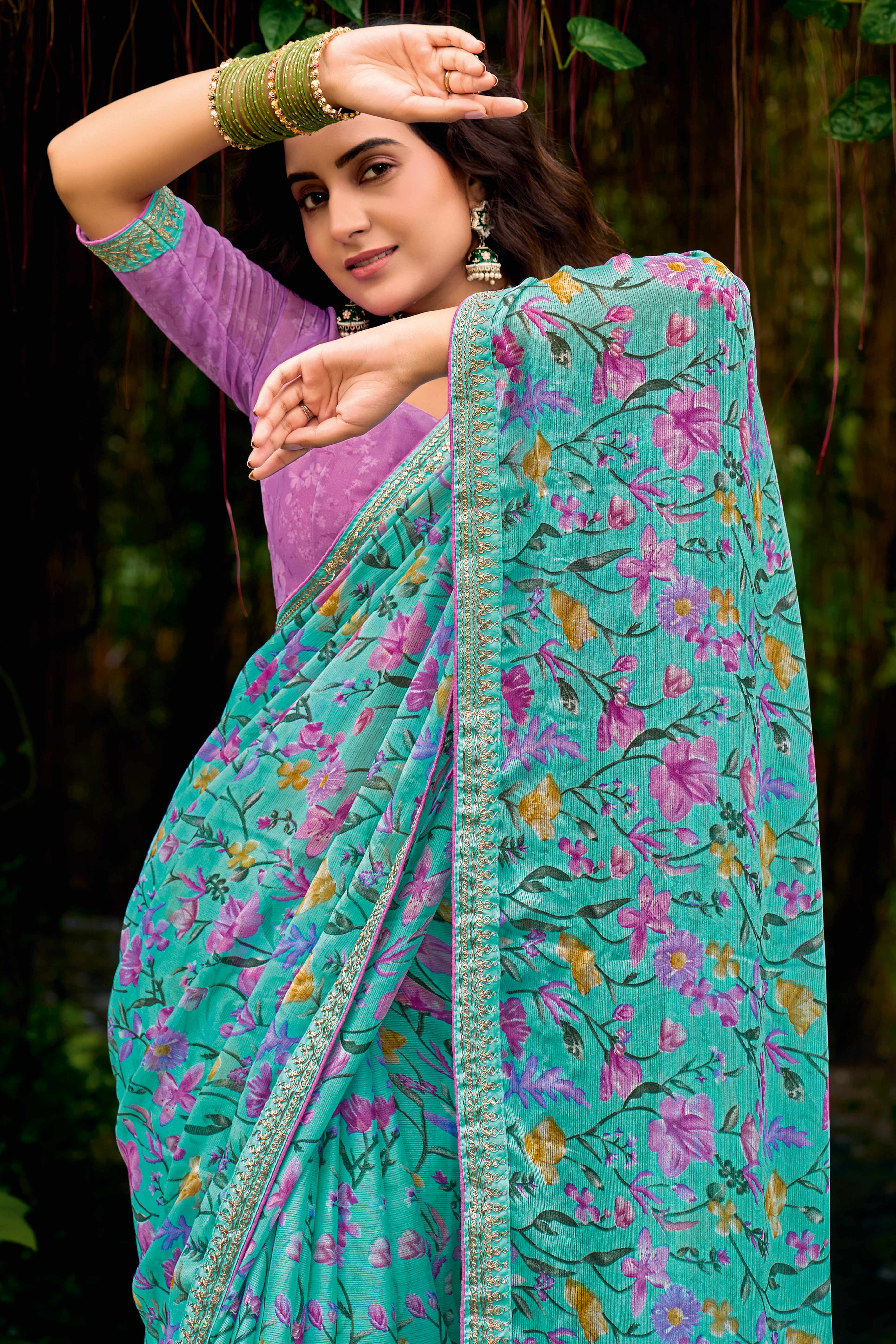 Turquoise Floral Chiffon Saree Enhanced with Fine Embroidery on the Border