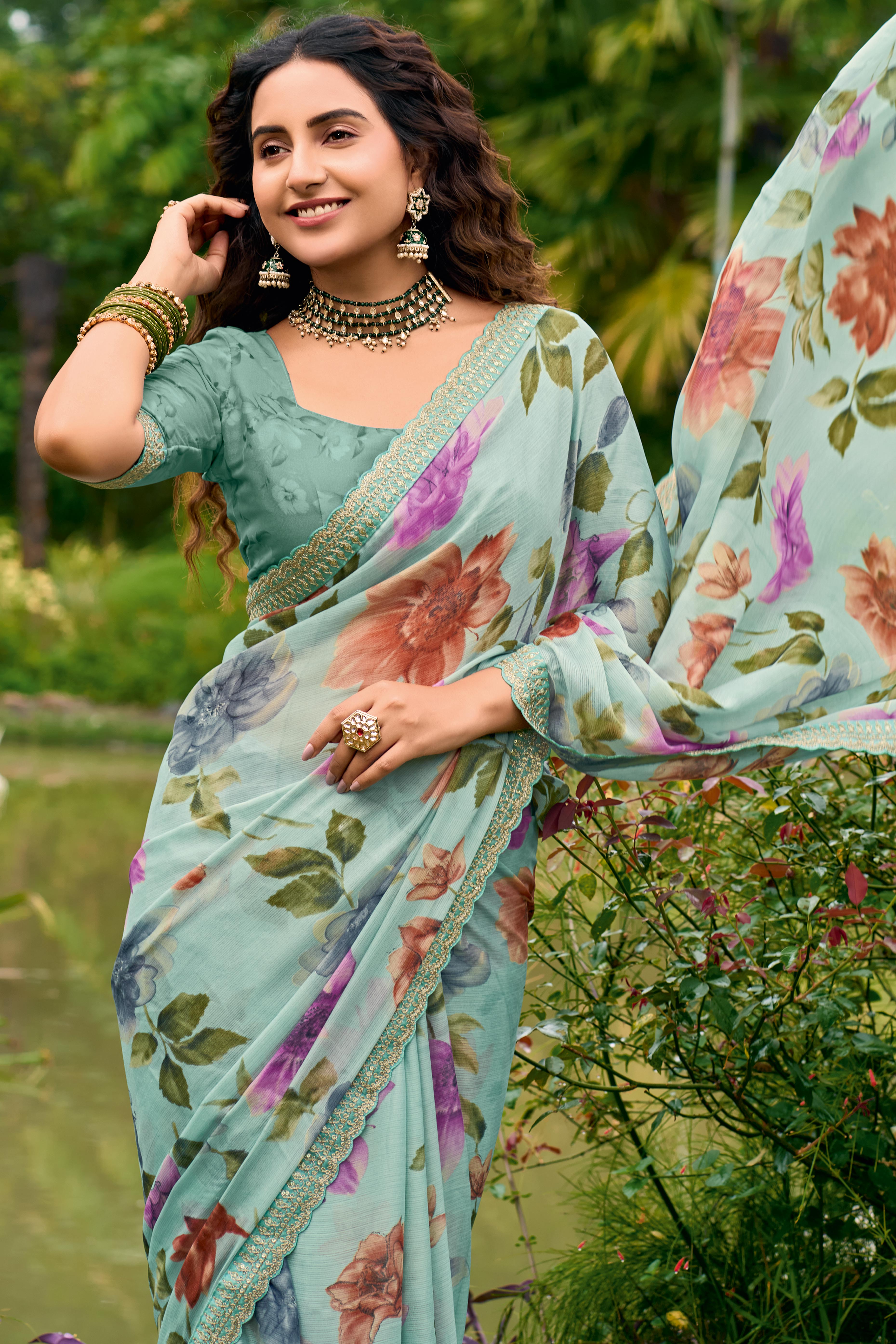 Sea Green Floral Chiffon Saree Enhanced with Fine Embroidery on the Border