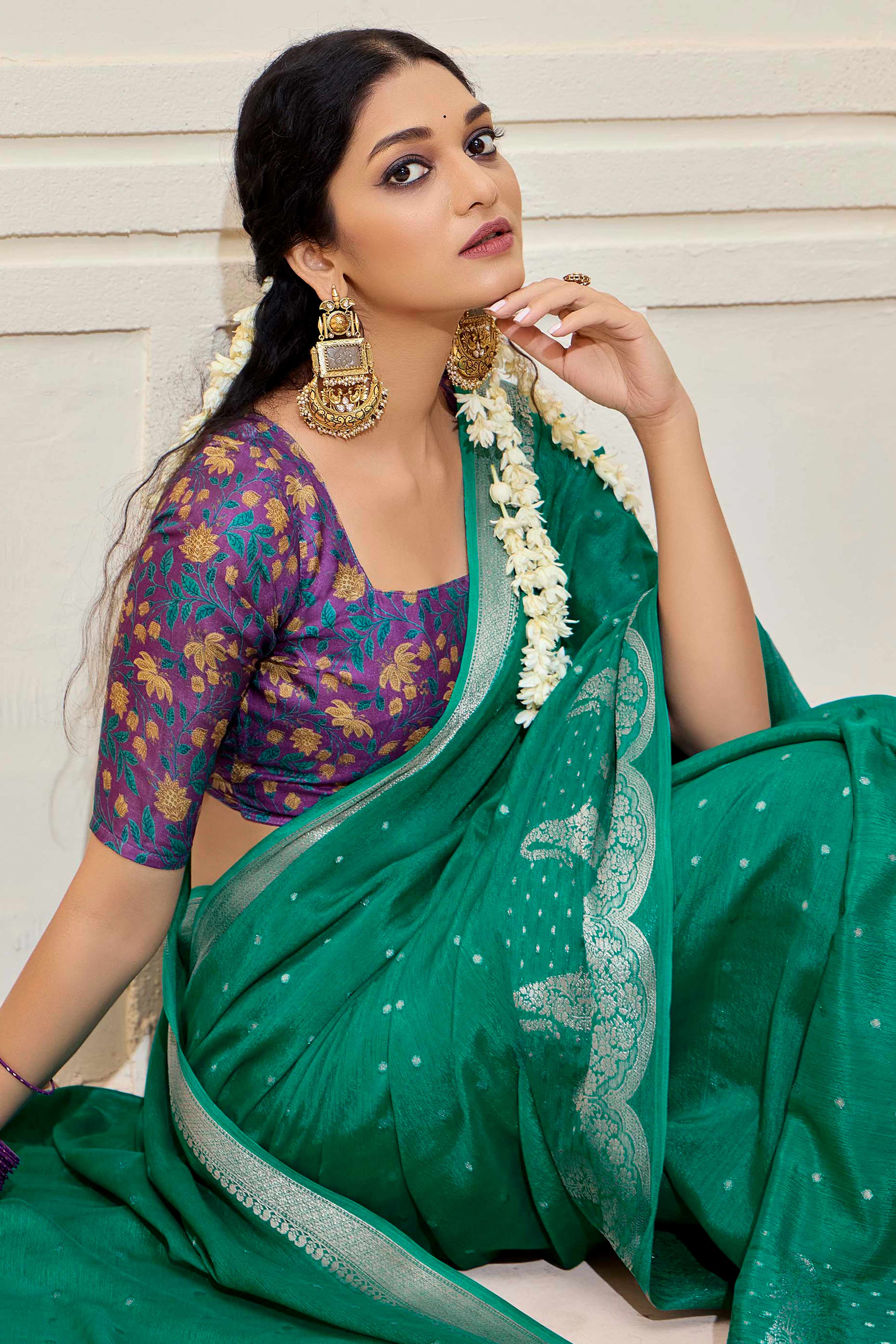 Rama Green Chinon Saree with Jacquard Weaving and Delicate Tassel Accents