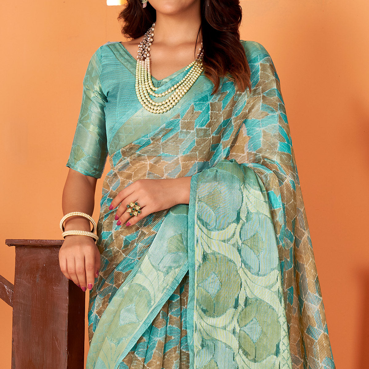 Sea Green Printed Organza Saree With Woven Border
