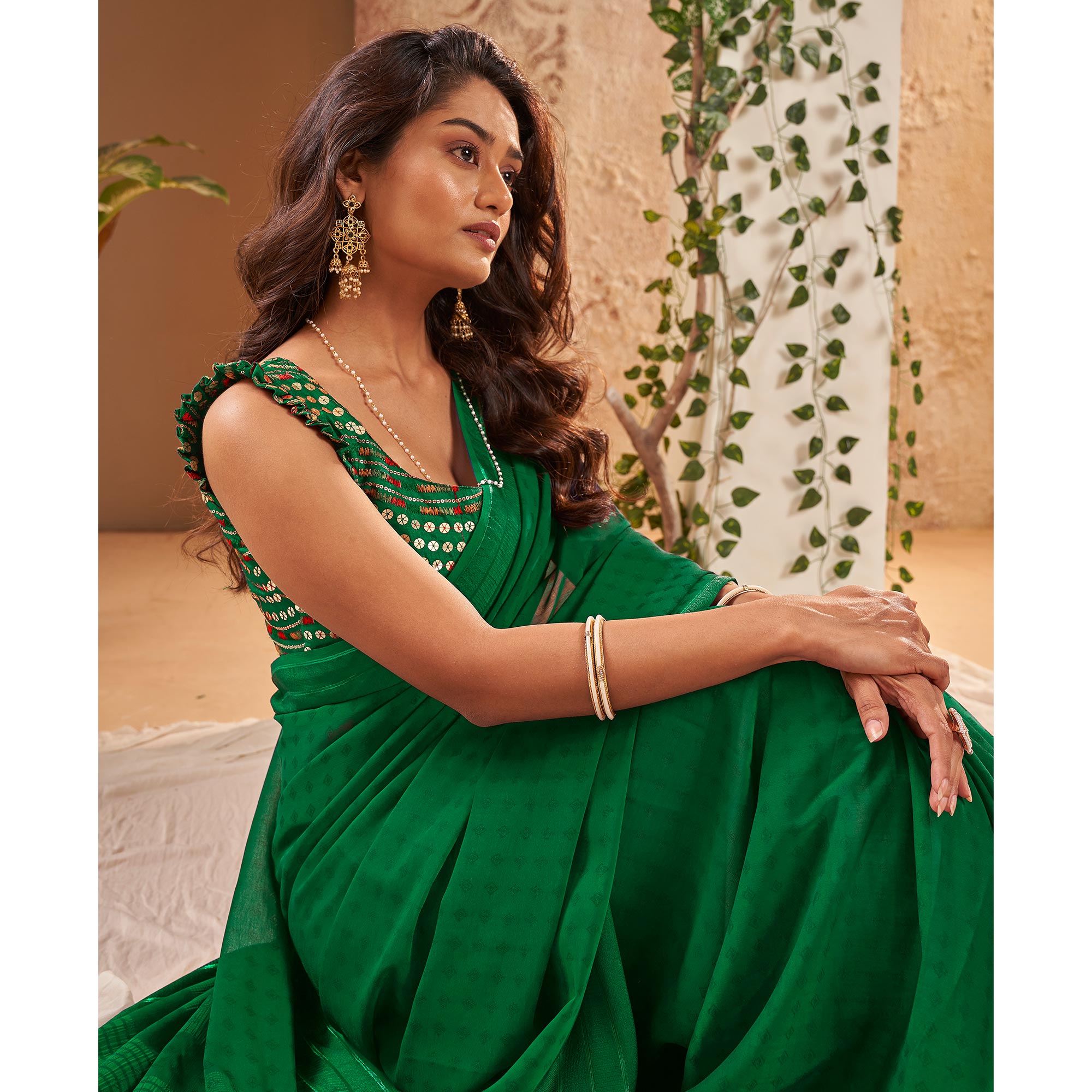 Green Woven Georgette Saree With Tassels