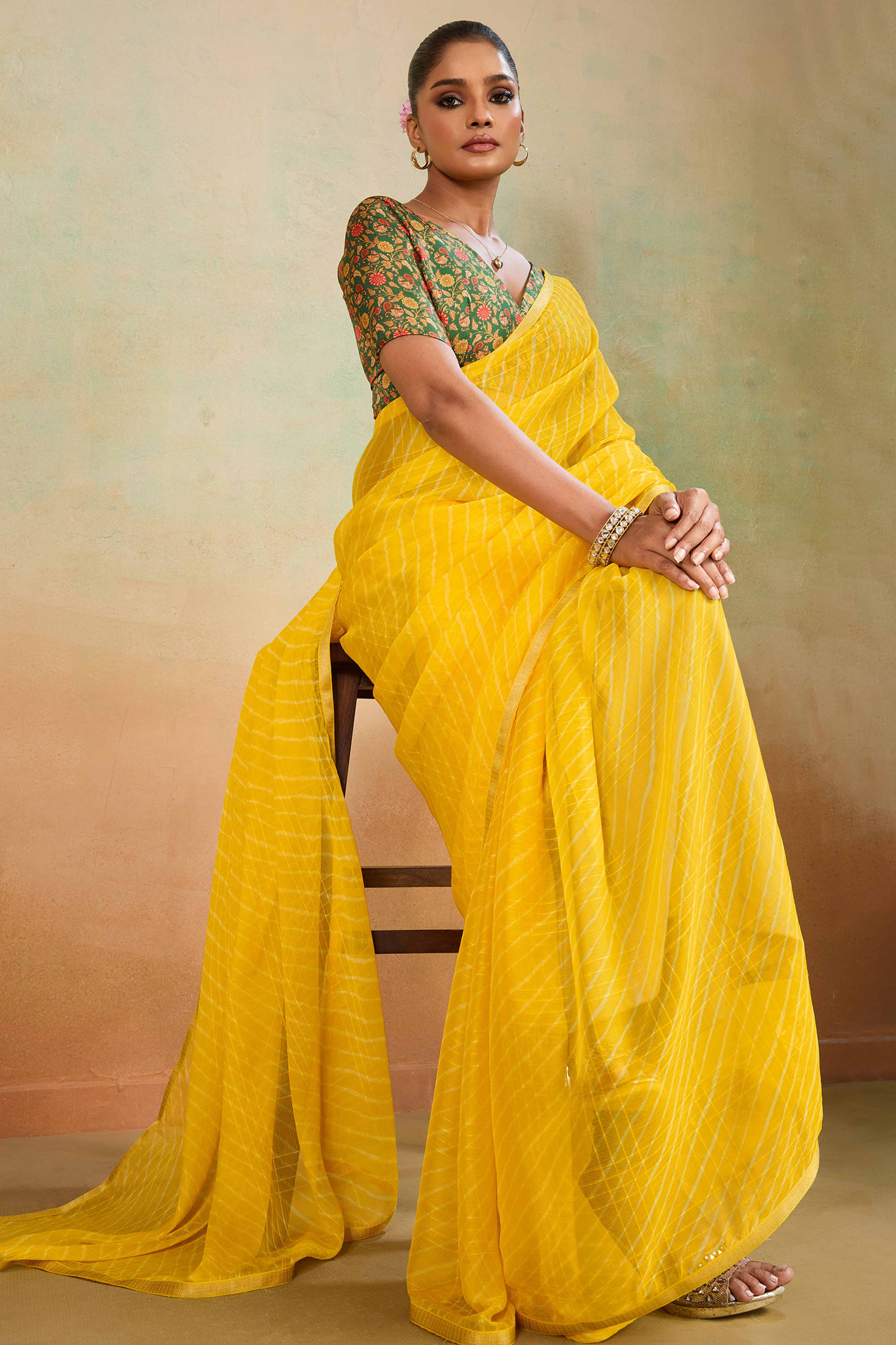 Yellow Leheriya Chiffon Saree Accented With Elegant Zari Lace Border Work