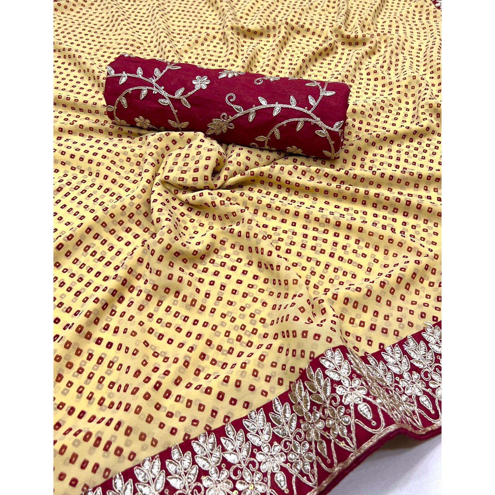 Cream Lightweight Georgette Saree Adorned with Classic Bandhani Prints and Lace Work