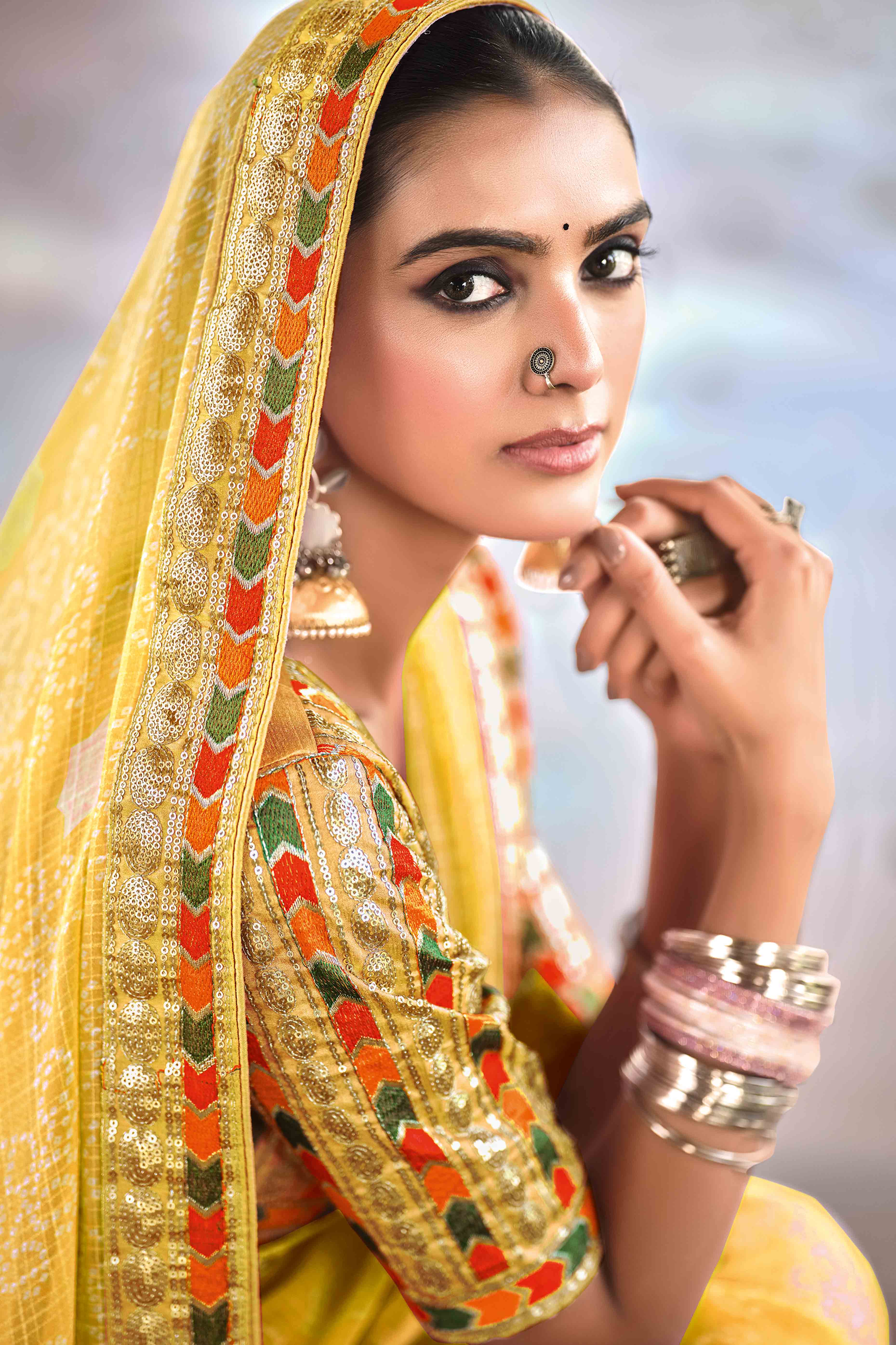 Yellow Bandhani Printed Georgette Saree With Glittering Sequin Embroidered Border