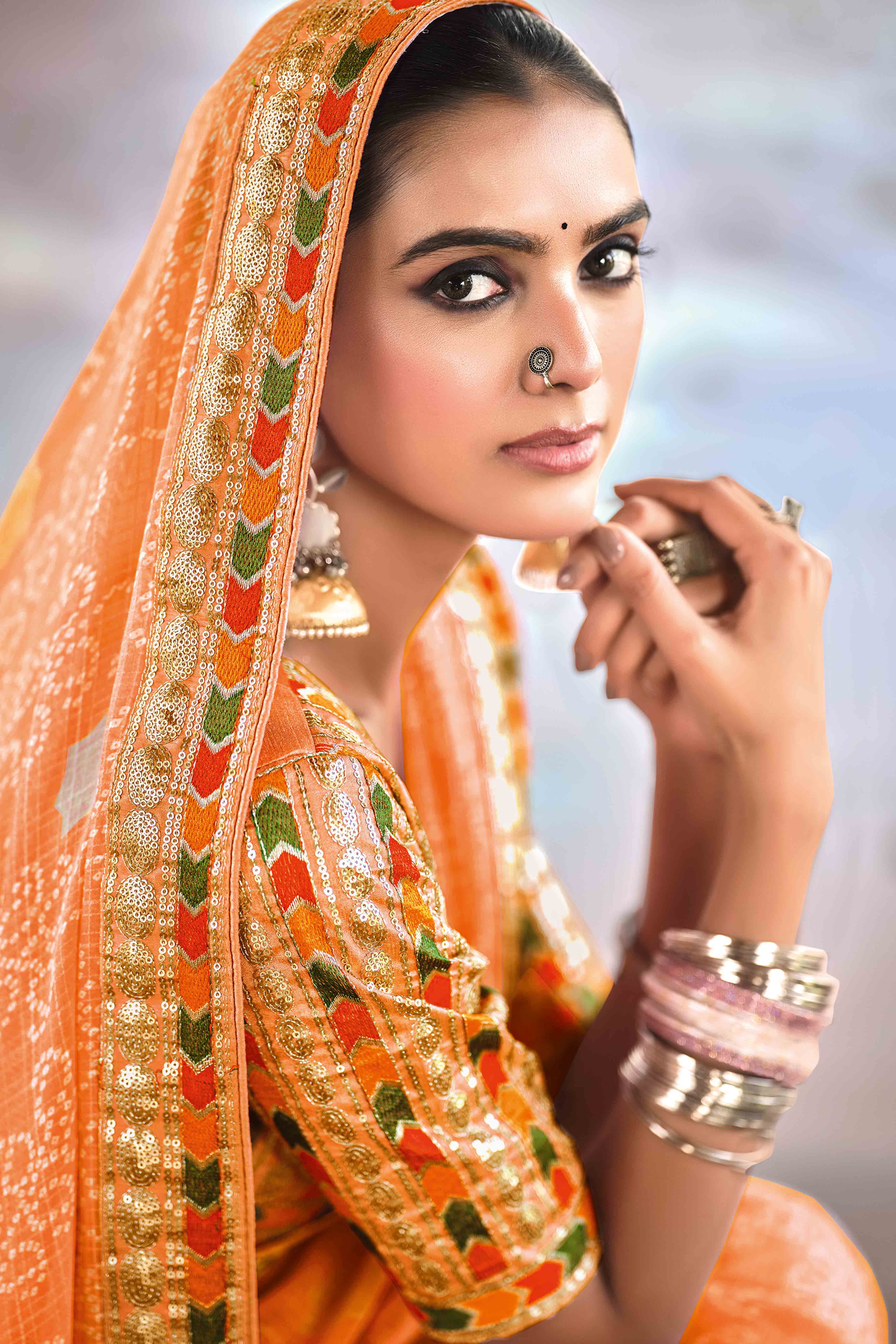 Orange Bandhani Printed Georgette Saree With Glittering Sequin Embroidered Border