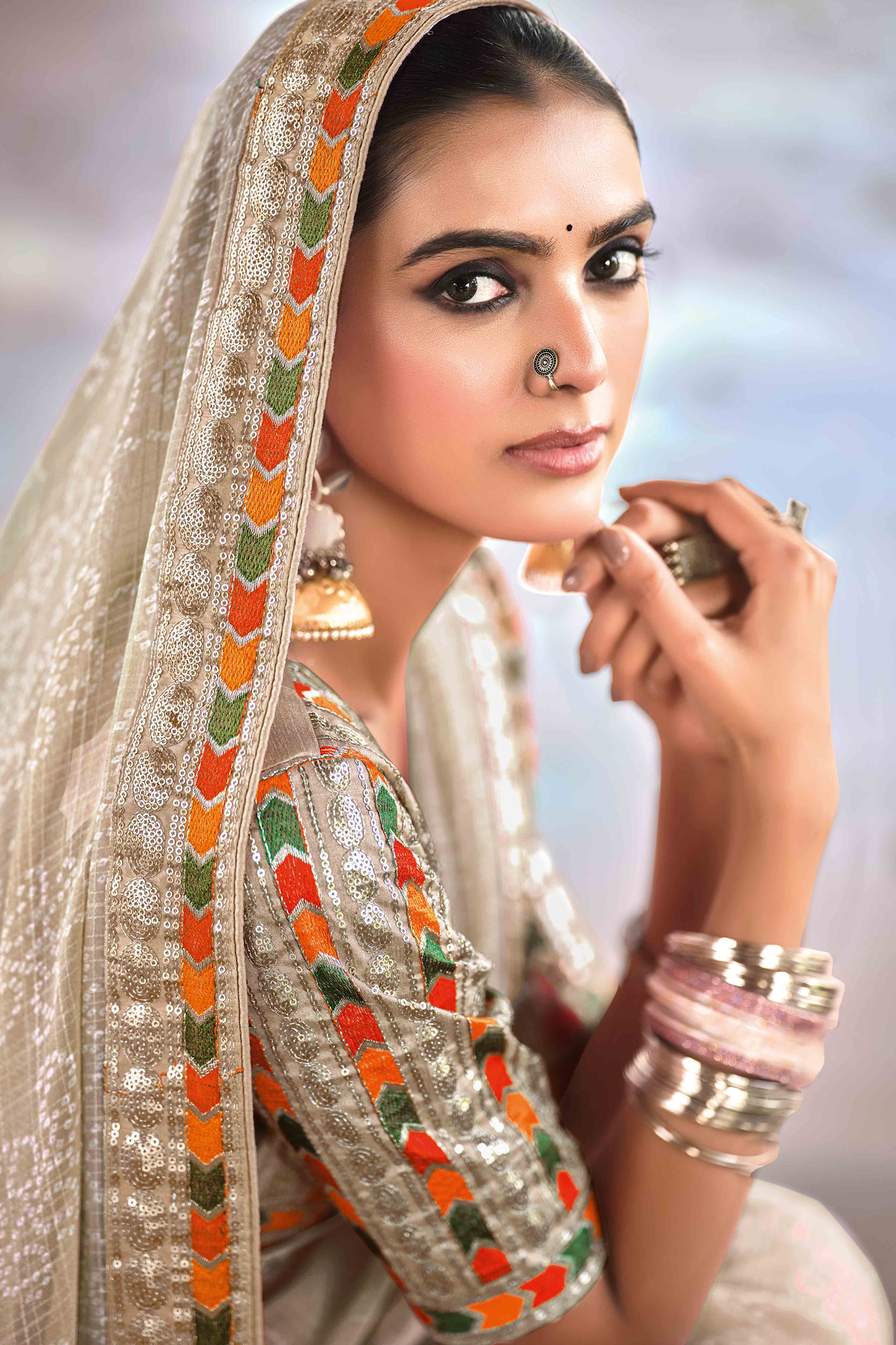 Taupe Bandhani Printed Georgette Saree With Glittering Sequin Embroidered Border