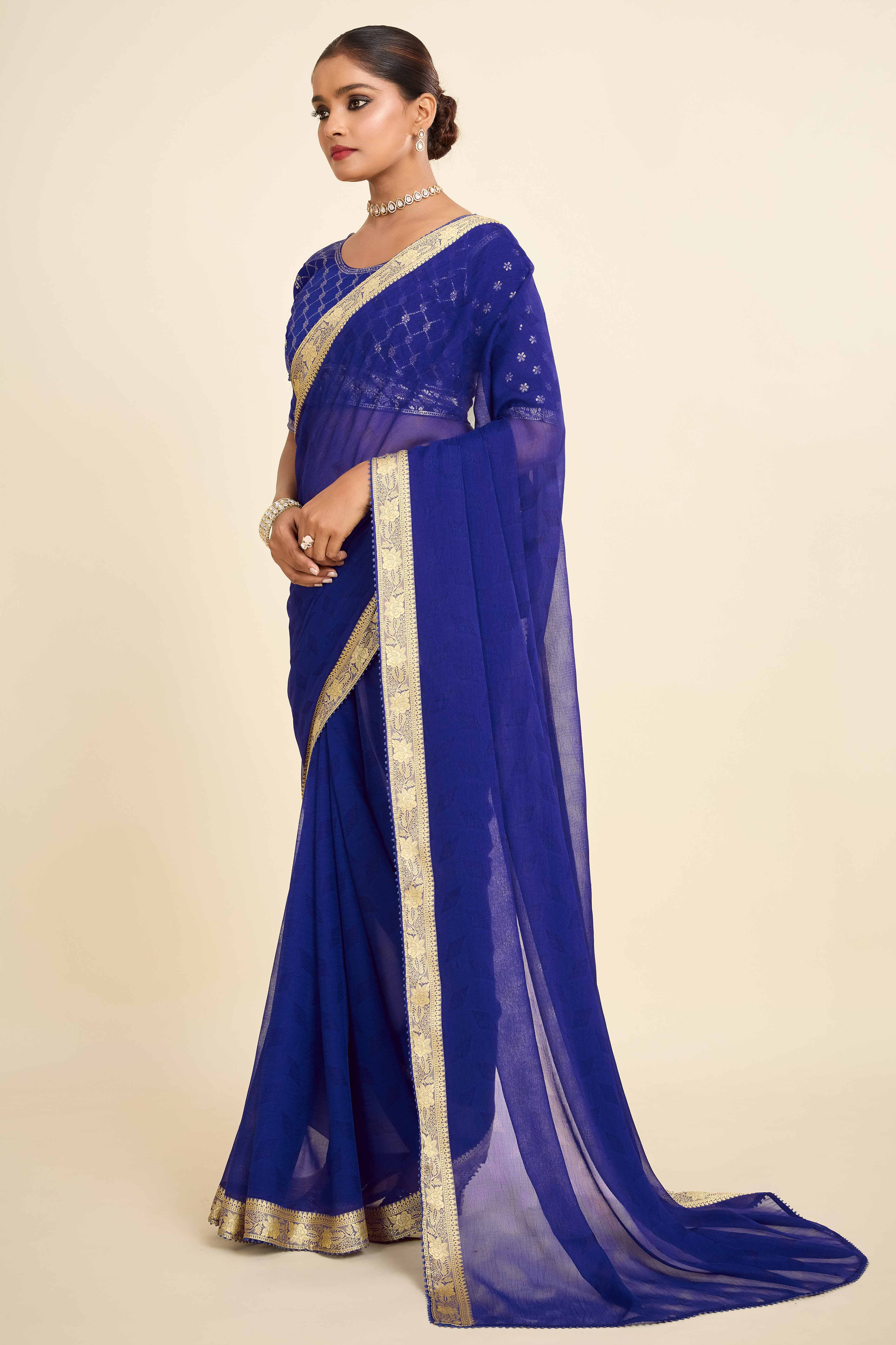 Blue Printed Chiffon Saree with Intricate Woven Edging