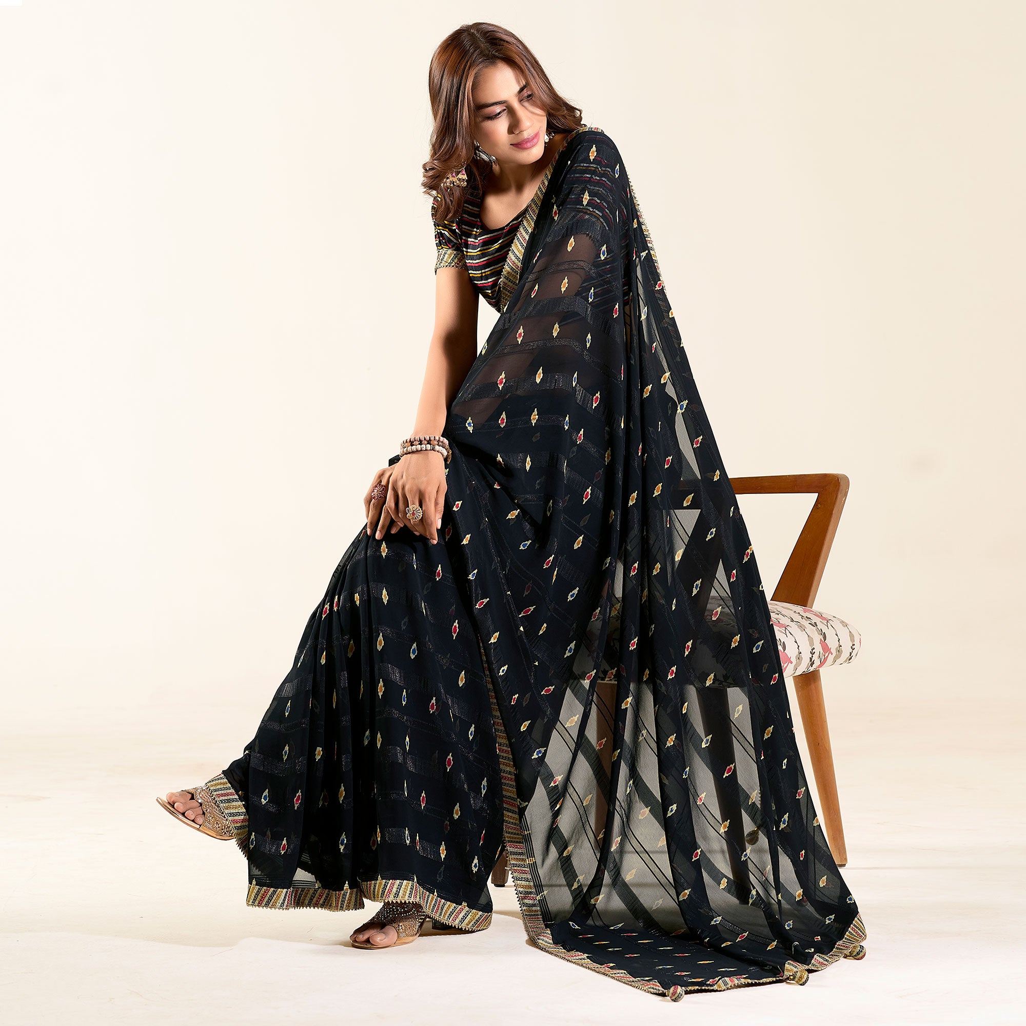 Black Printed With Woven Georgette Saree With Tassels