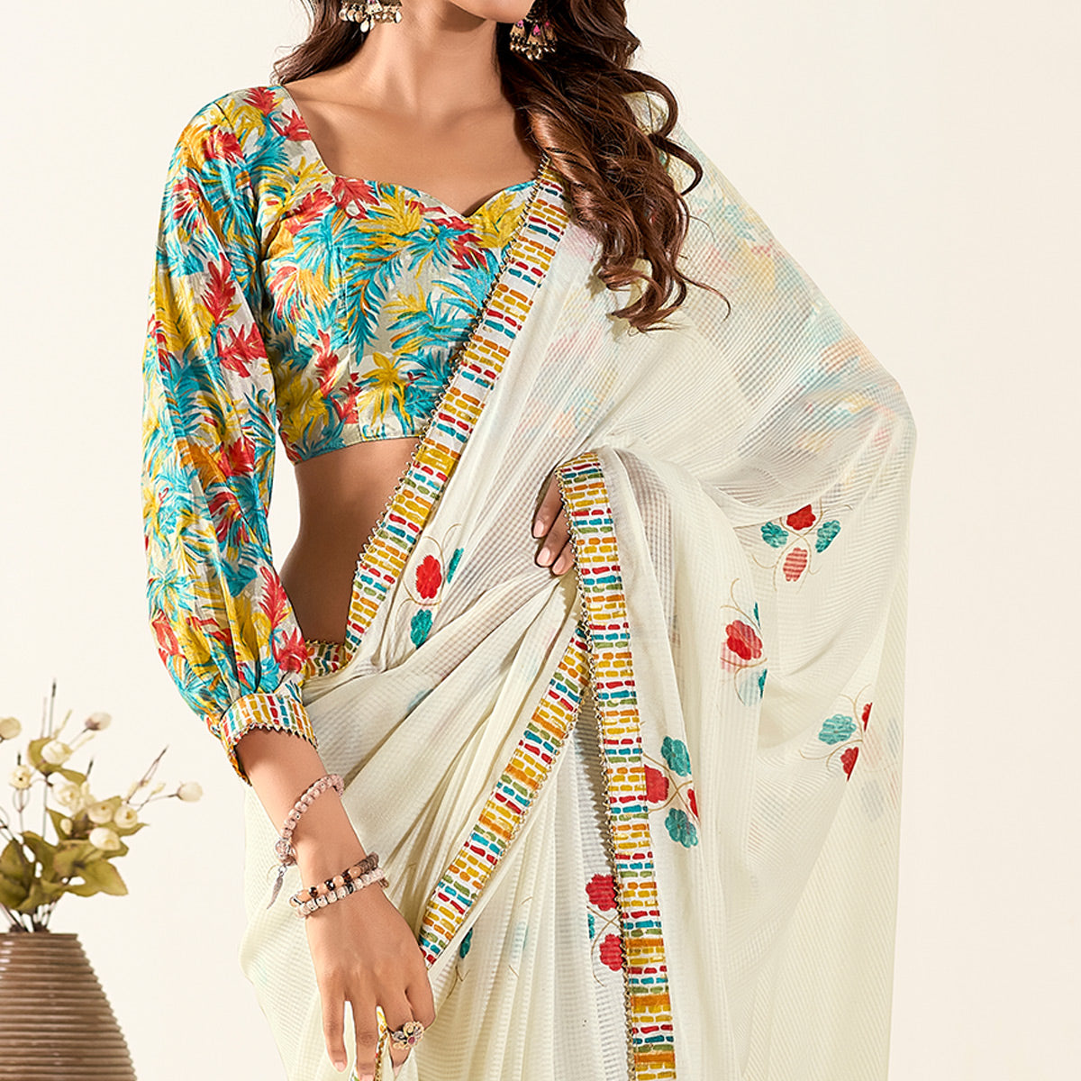 Off White Printed With Woven Georgette Saree With Tassels