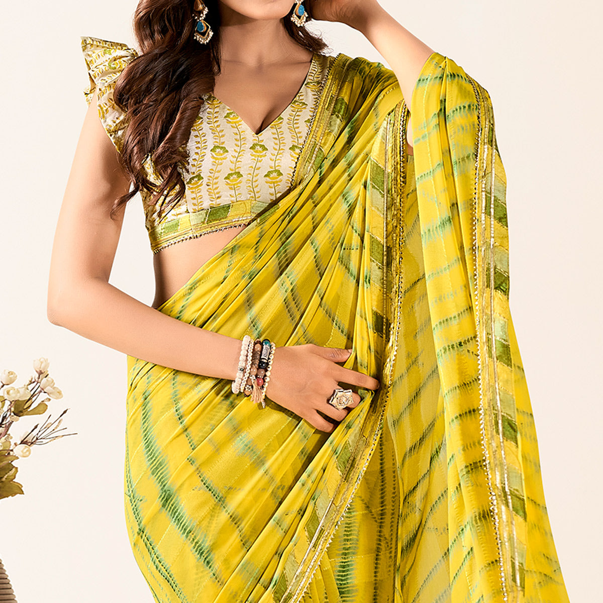 Yellow Printed With Woven Georgette Saree With Tassels