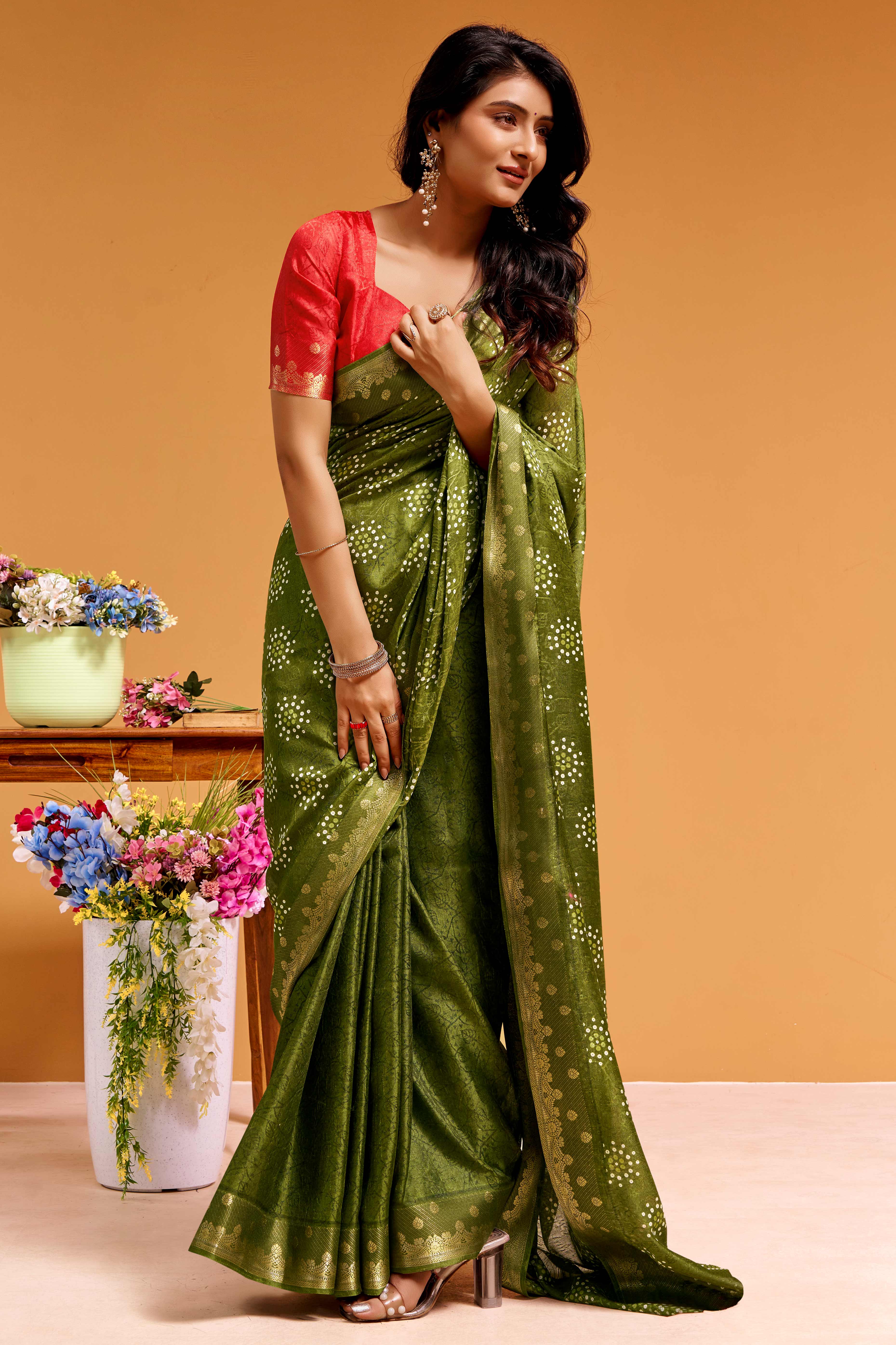Luxurious Green Tussar Silk Saree Featuring Traditional Bandhani Print & Peacock Jacquard Border