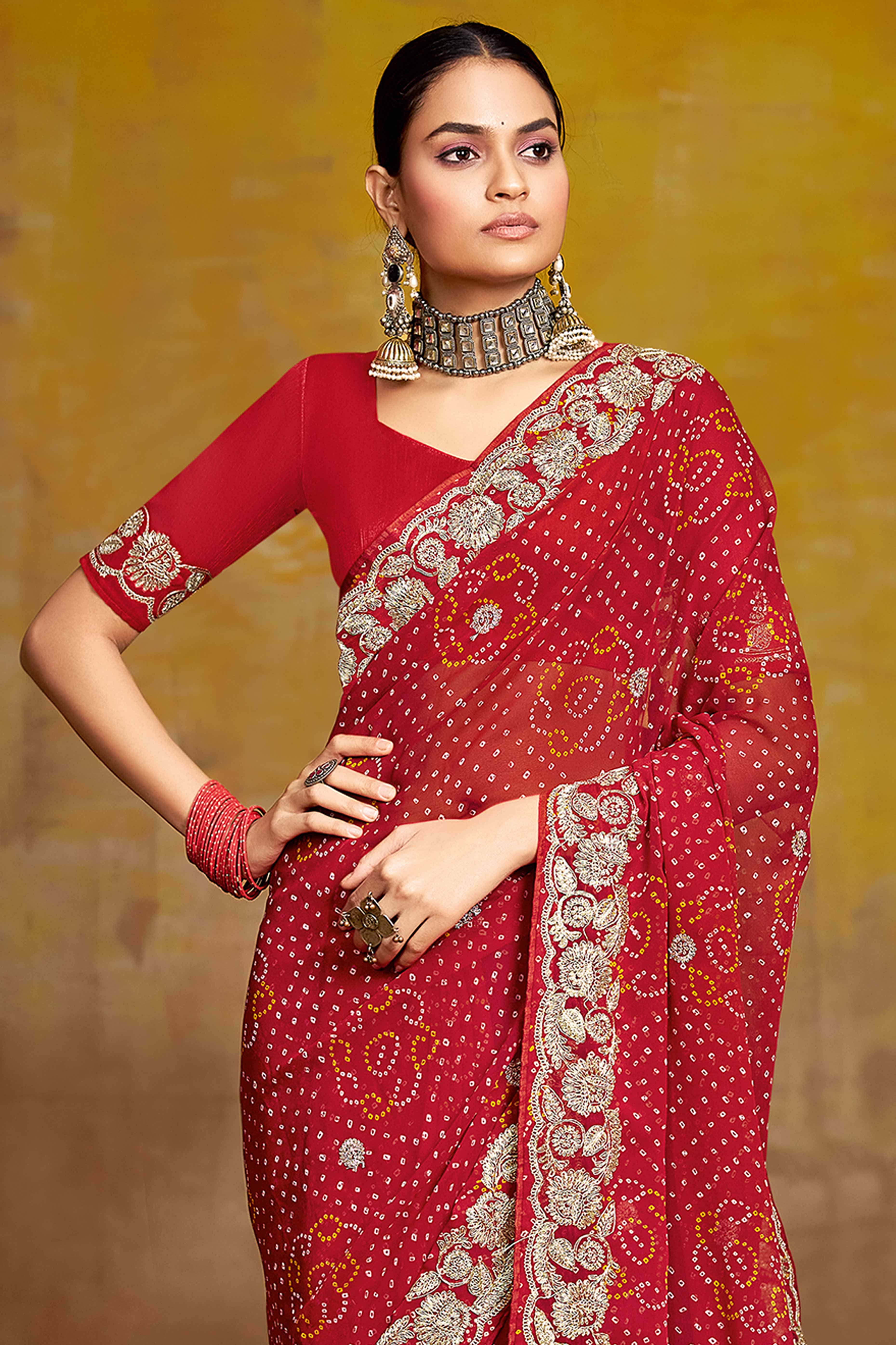 Maroon Georgette Saree Adorned With Traditional Bandhani Prints & Intricate Floral Embroidery
