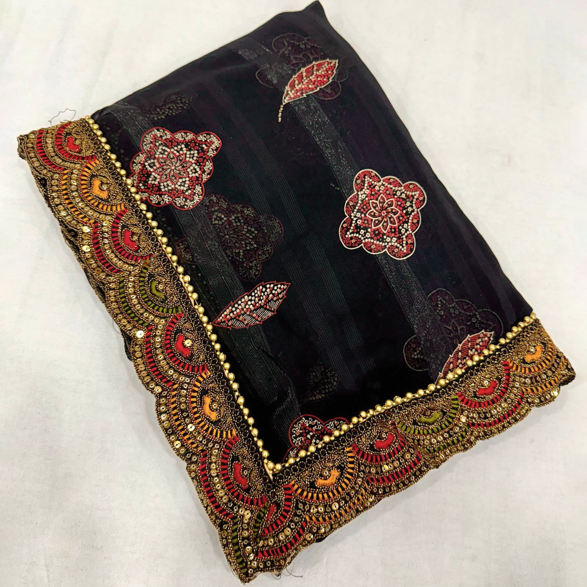 Black Bandhani Printed Georgette Saree for Festive Wear with Lace Detailing