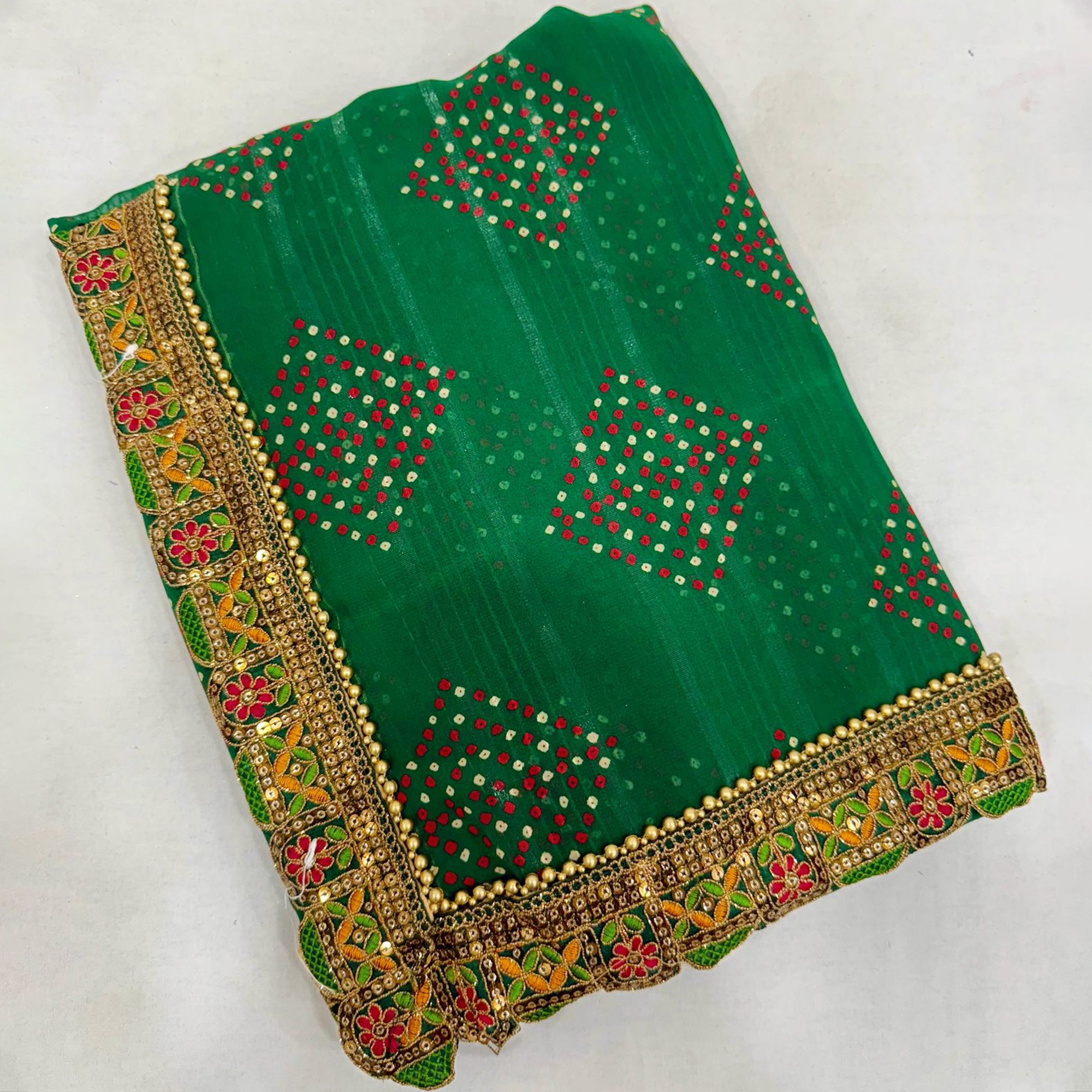 Green Bandhani Printed Georgette Saree for Festive Wear with Lace Detailing
