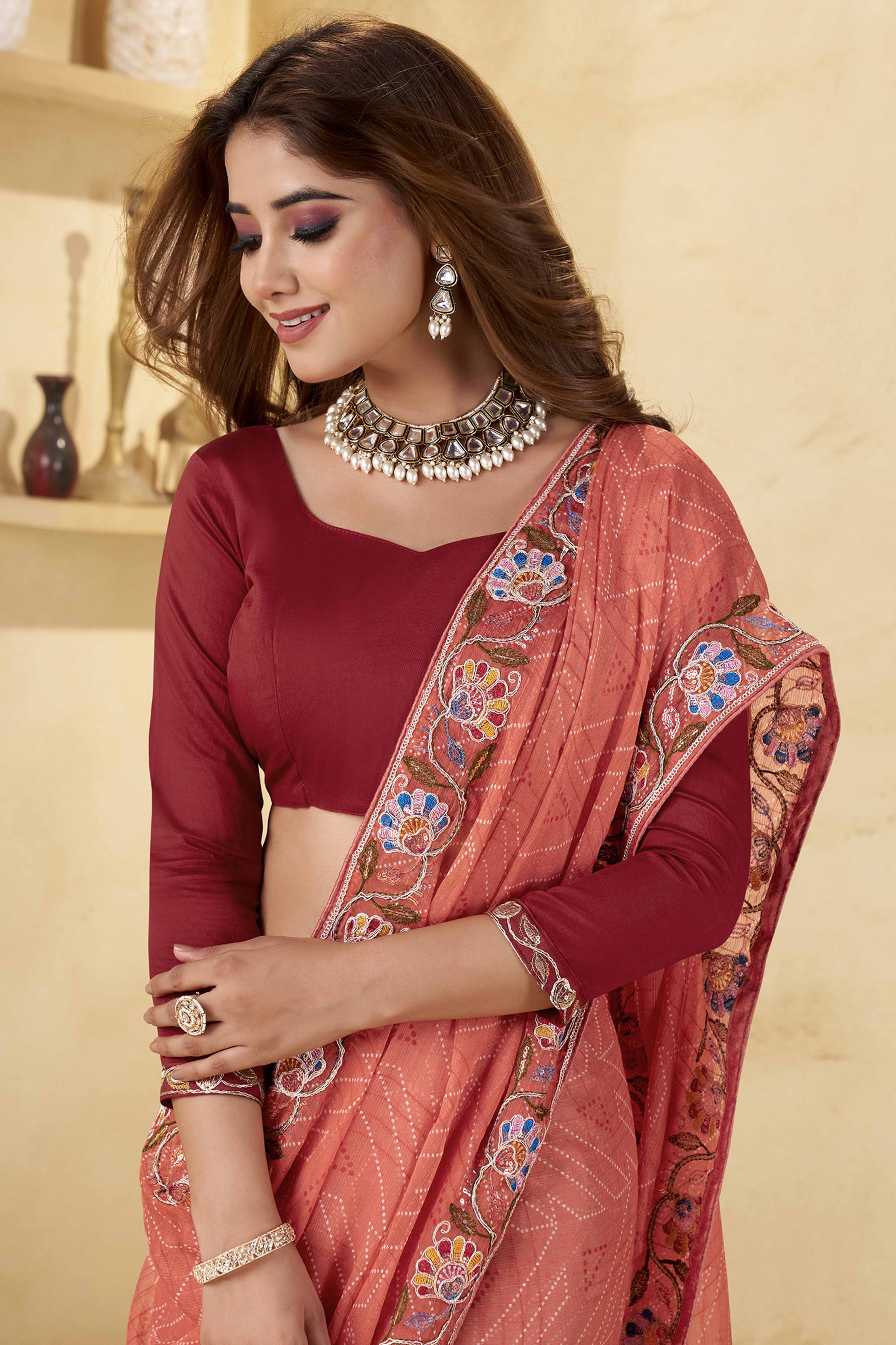 Terracotta Orange Geometric Printed Chiffon Saree Accented With Floral Sequins Embroidered Border